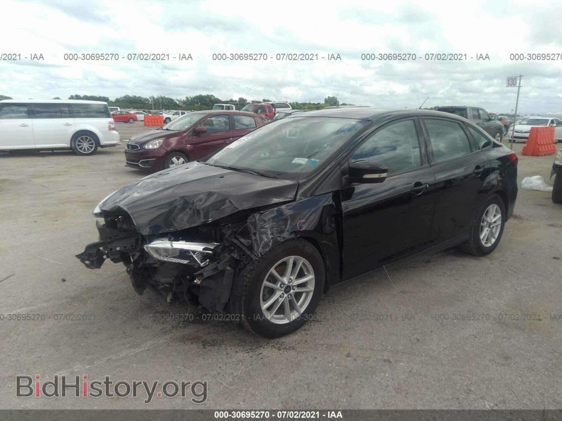 2016 FORD FOCUS - VIN: 1FADP3F20GL243393 - Photo 2