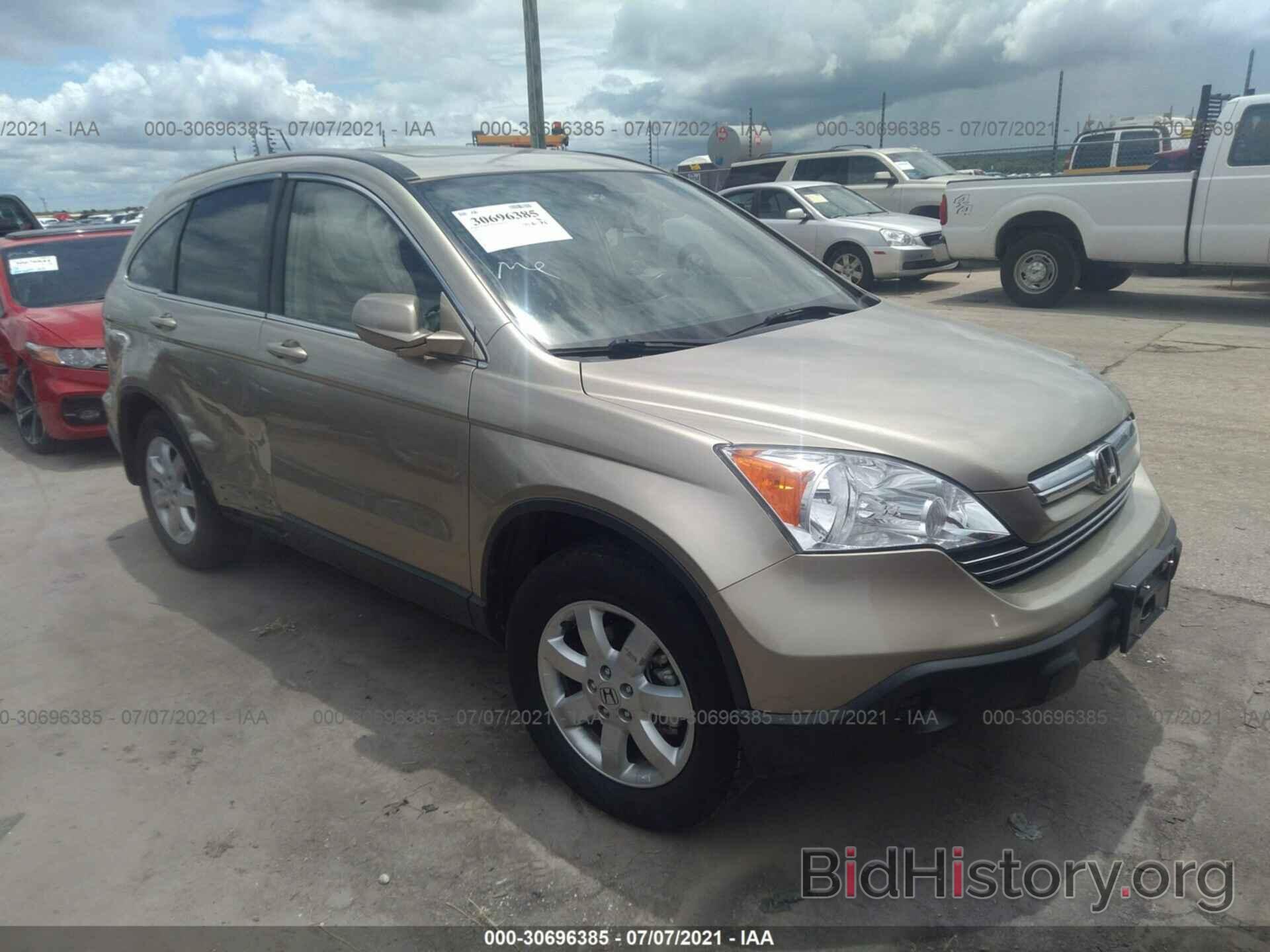 Photo JHLRE38709C014829 - HONDA CR-V 2009