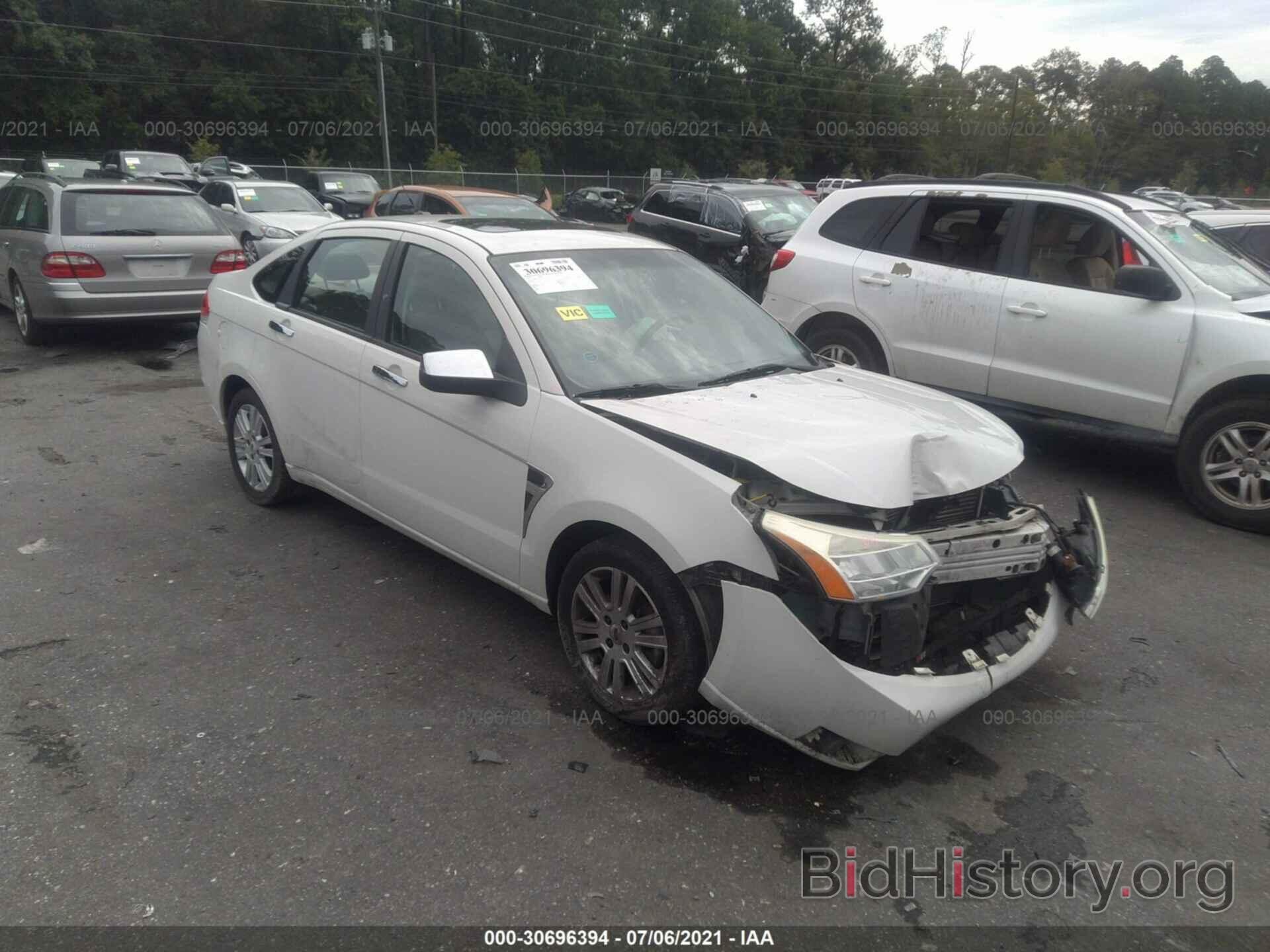 Photo 1FAHP37N19W235654 - FORD FOCUS 2009