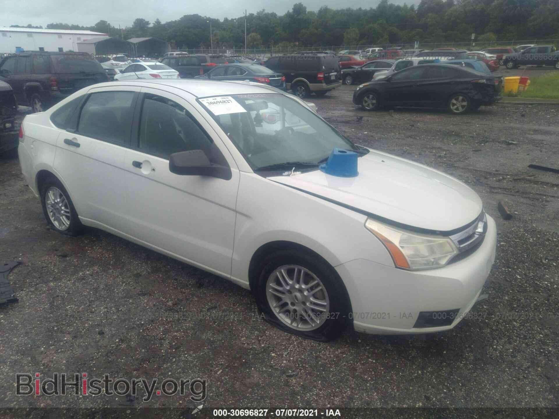 Фотография 1FAHP35N19W169920 - FORD FOCUS 2009