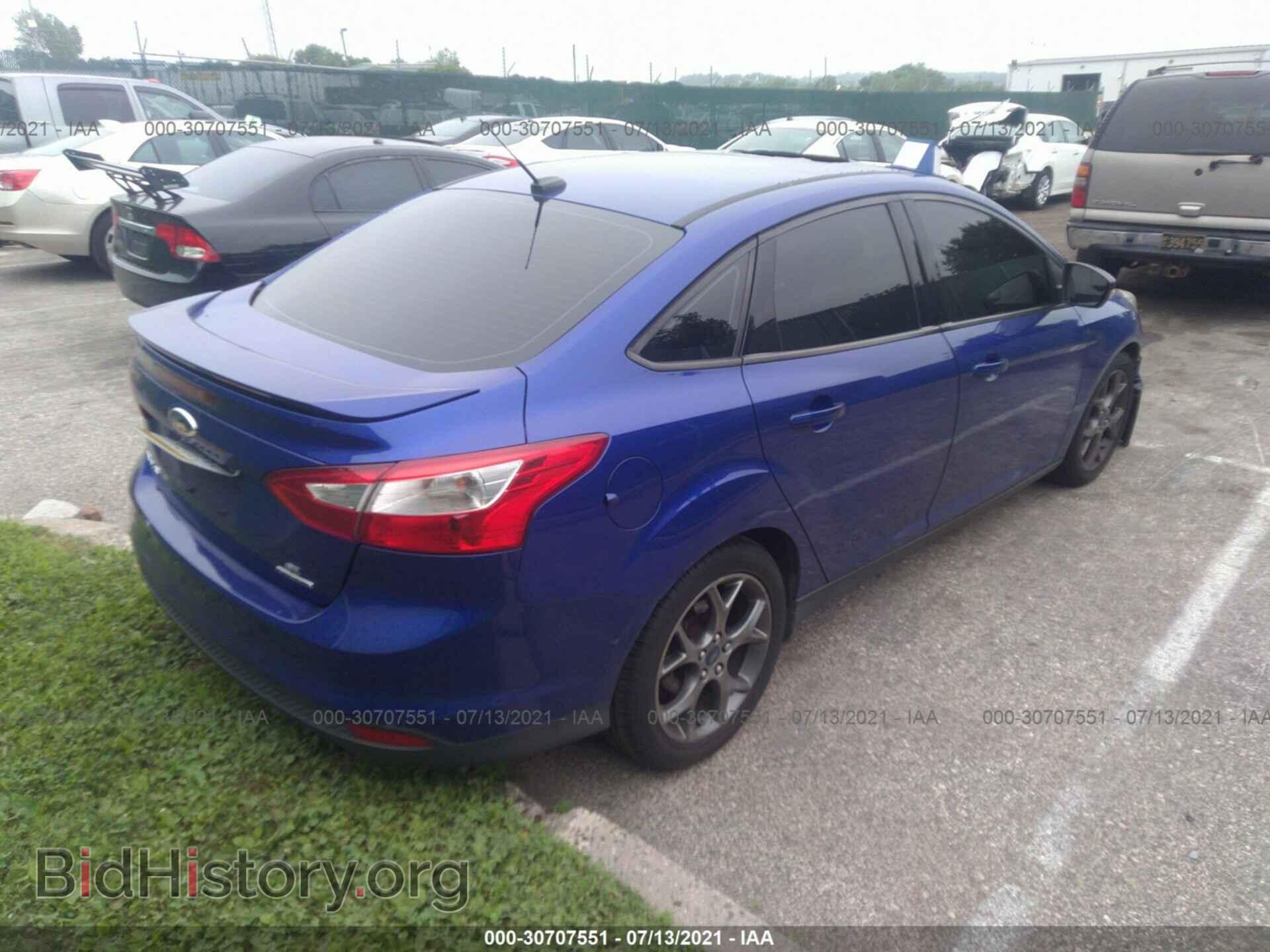 2014 FORD FOCUS - VIN: 1FADP3F2XEL167923 - Photo 4