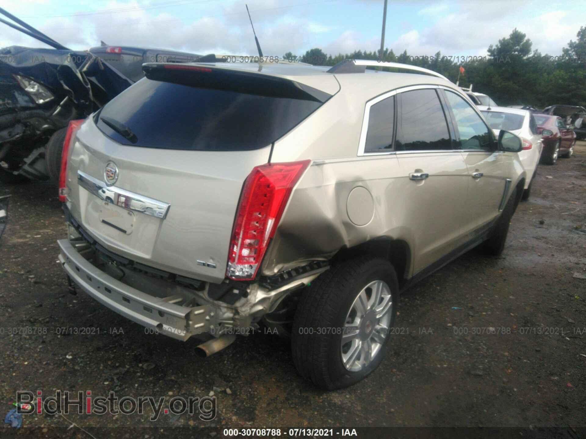 2014 CADILLAC SRX - VIN: 3GYFNBE32ES577679 - Фото 4