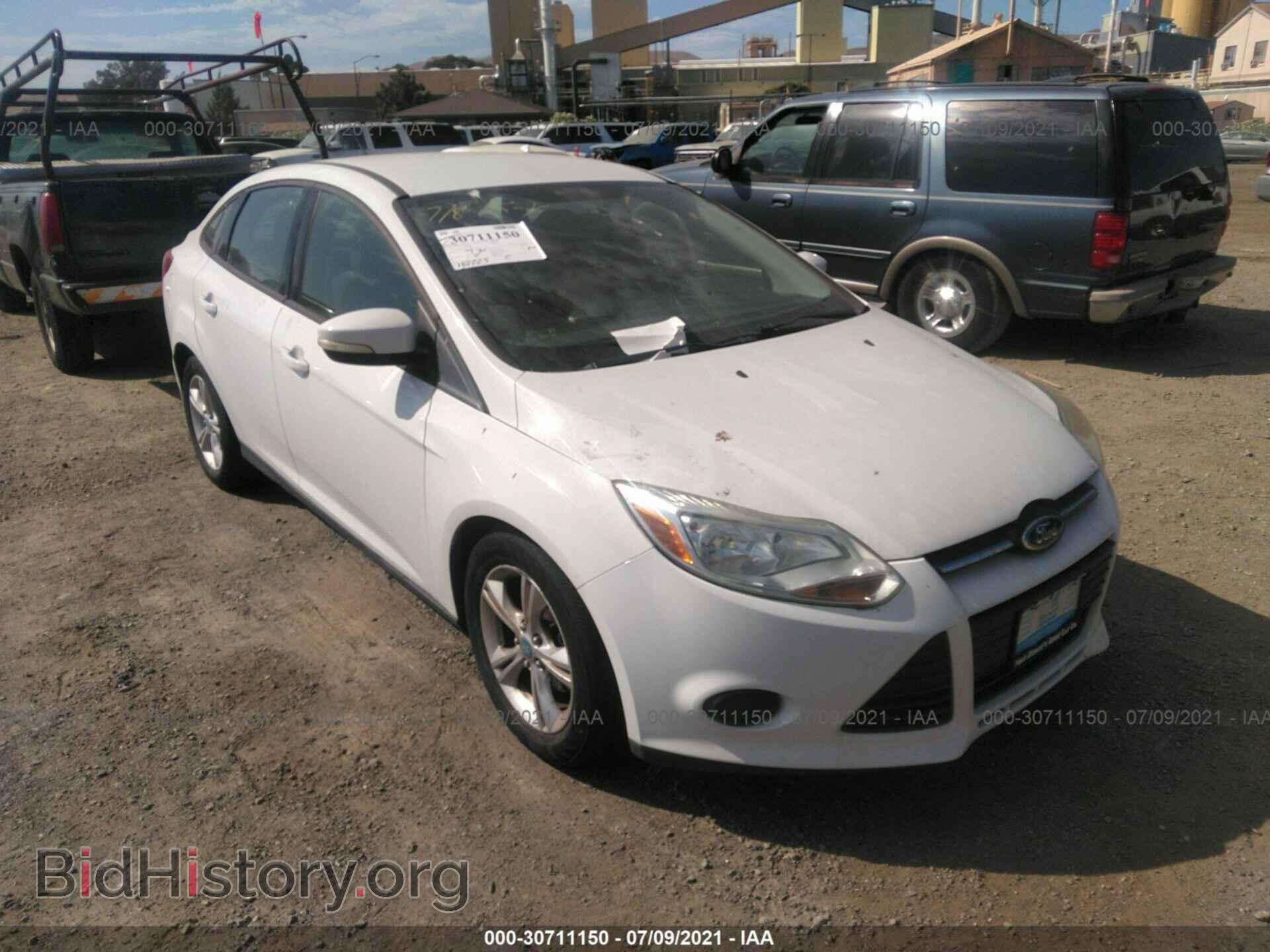 Фотография 1FADP3F26DL213083 - FORD FOCUS 2013