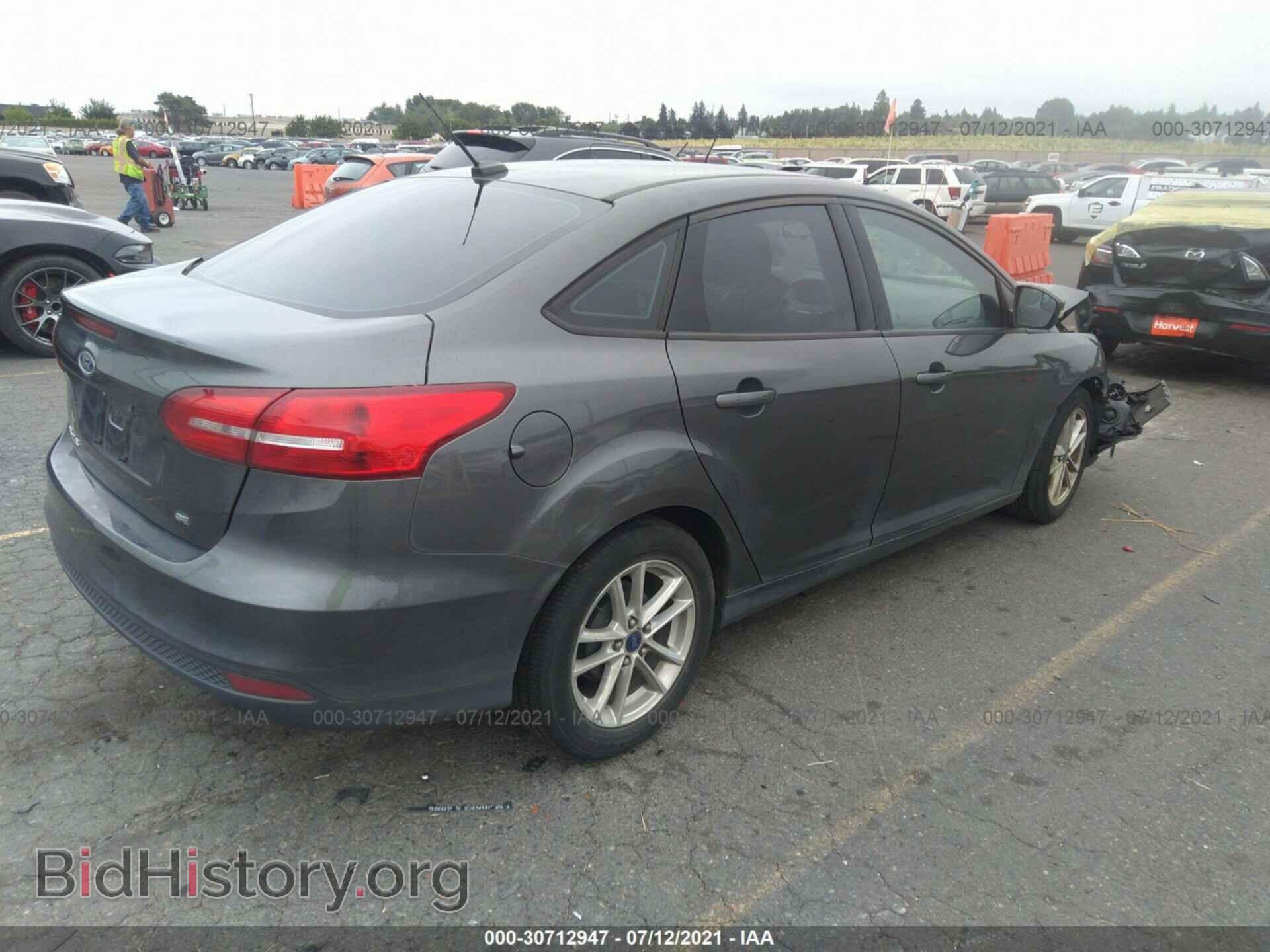 2015 FORD FOCUS - VIN: 1FADP3F2XFL256974 - Photo 4