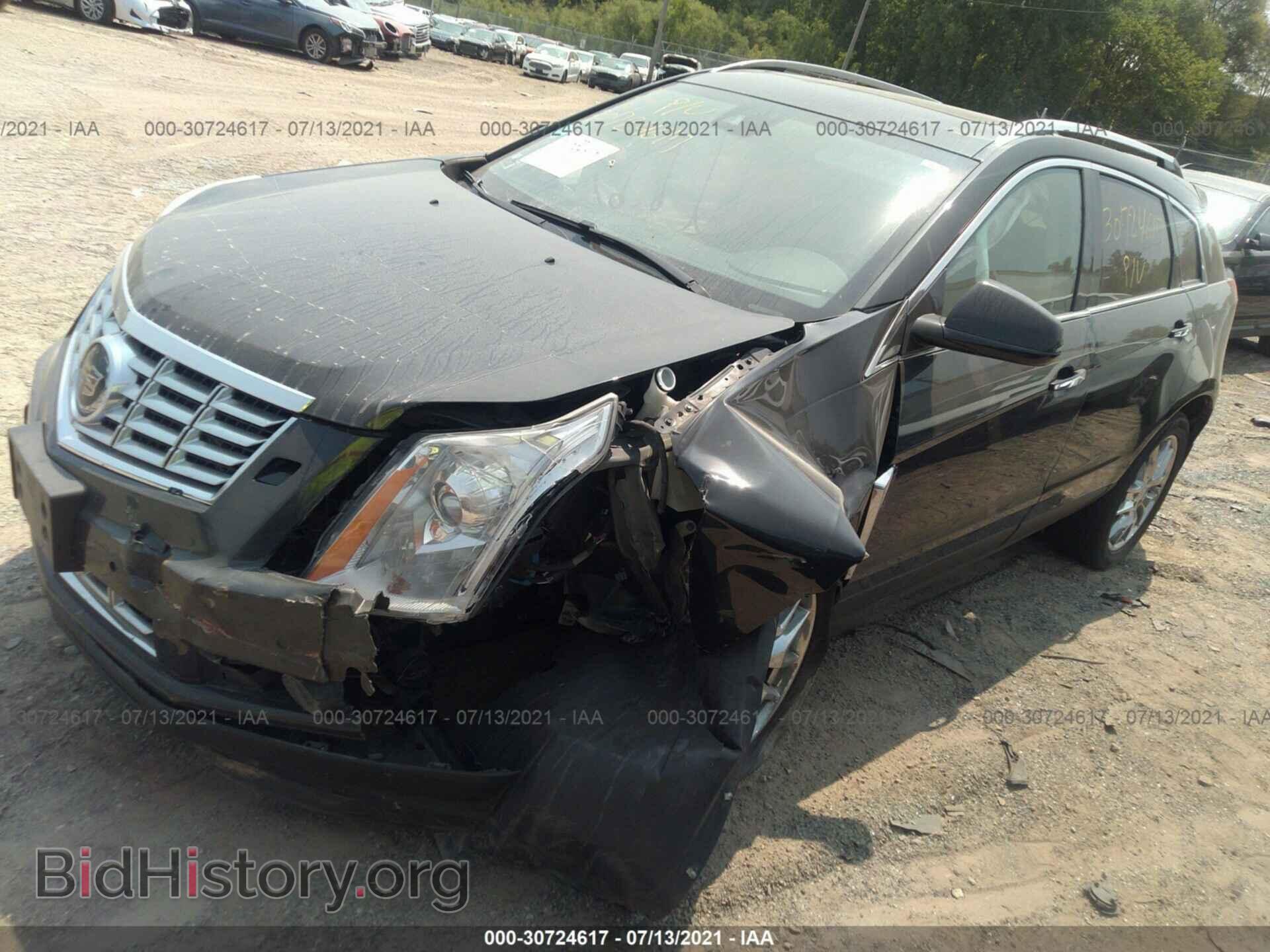 2014 CADILLAC SRX - VIN: 3GYFNGE33ES559396 - Фото 2