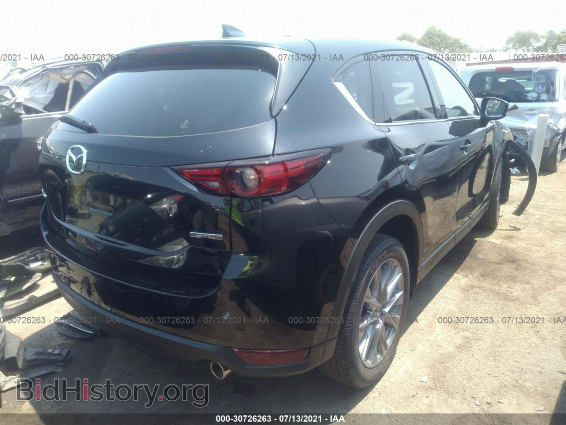 2021 MAZDA CX-5 - VIN: JM3KFADM6M1311272 - Фото 4
