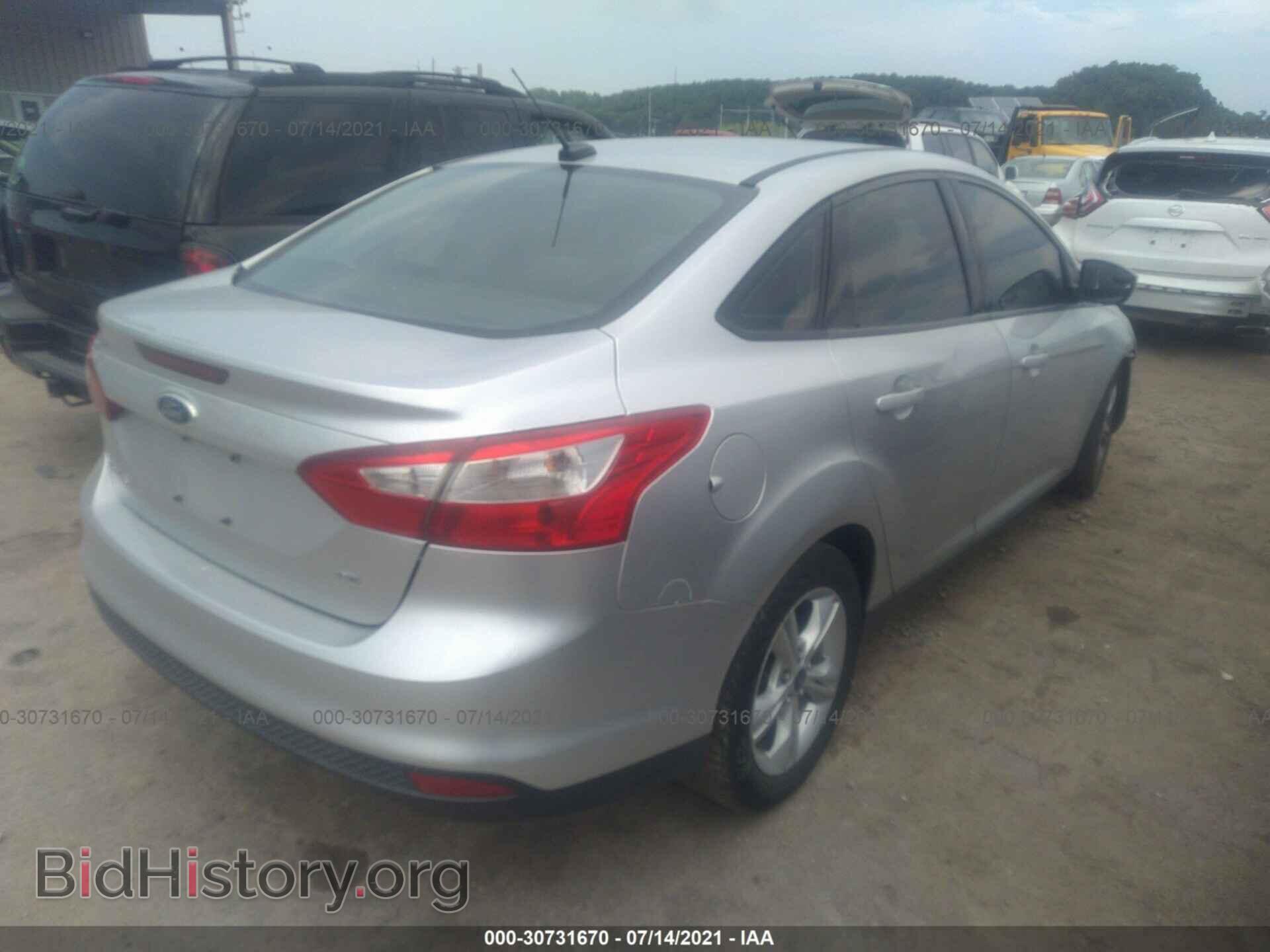 2014 FORD FOCUS - VIN: 1FADP3F22EL386651 - Photo 4