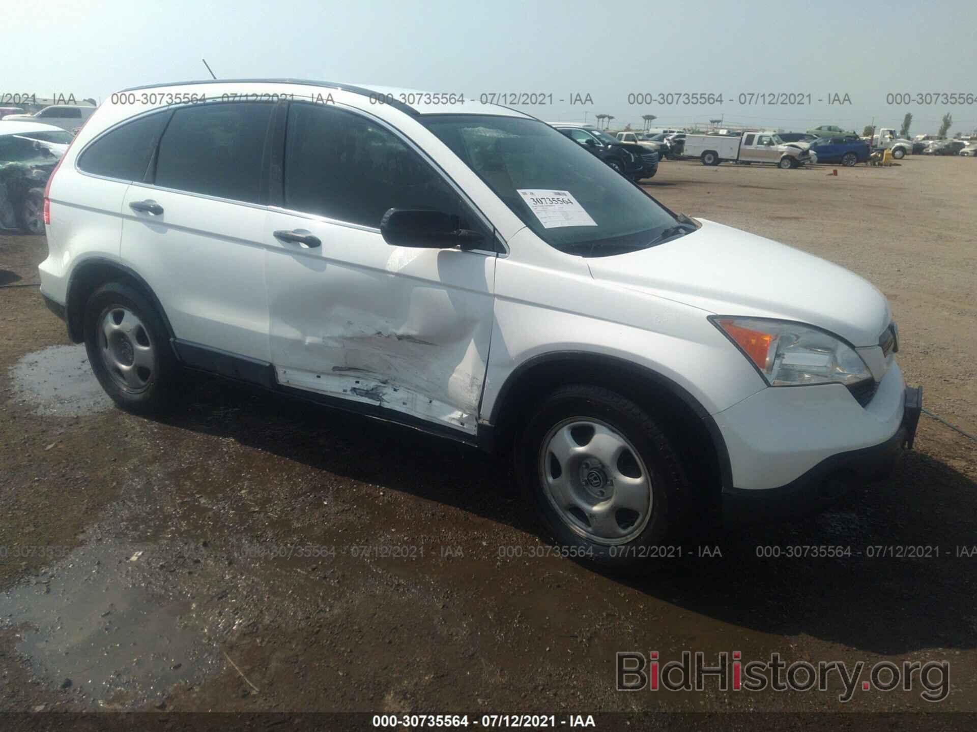 Photo JHLRE38389C014266 - HONDA CR-V 2009