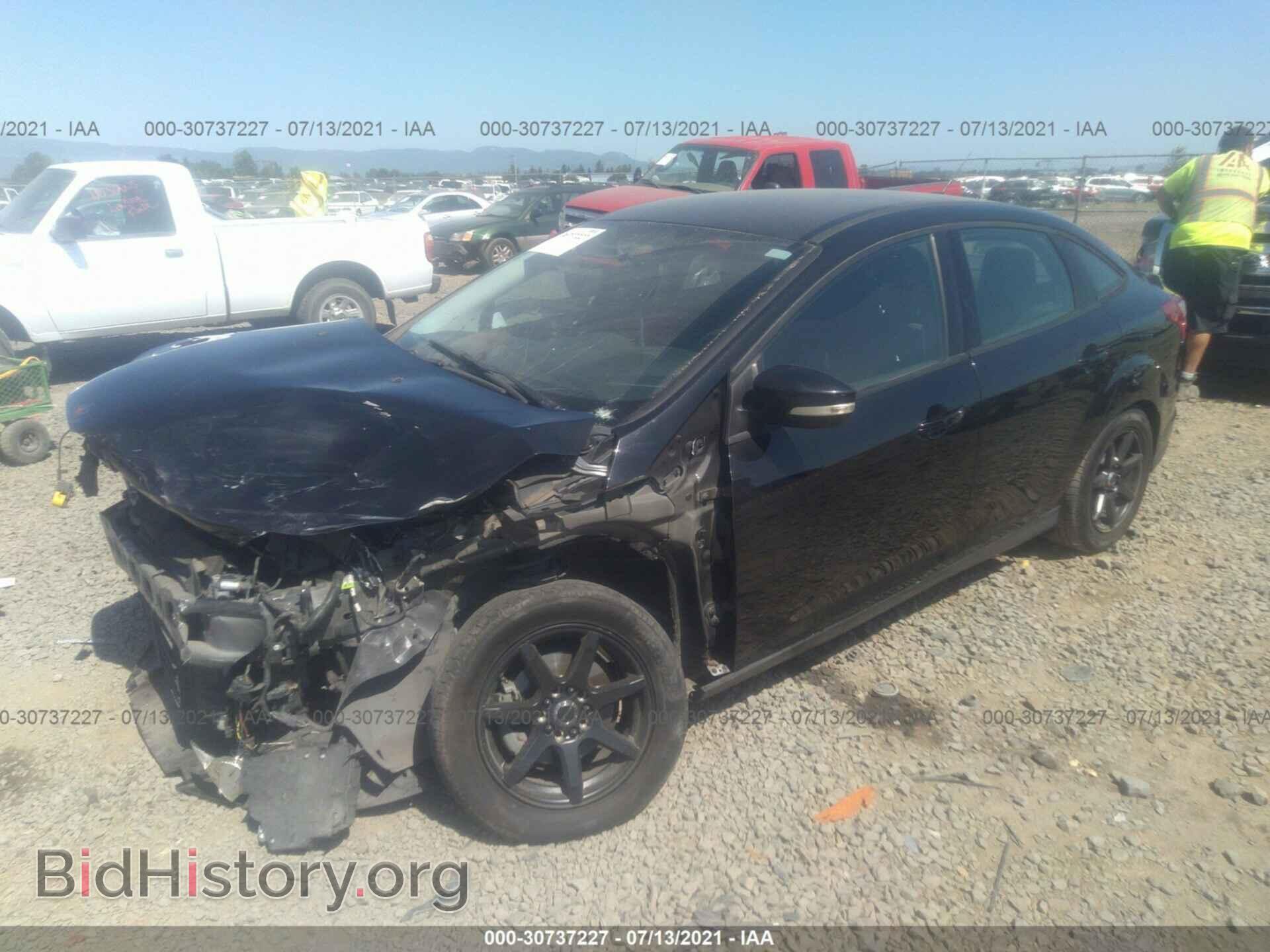 2014 FORD FOCUS - VIN: 1FADP3F21EL407814 - Photo 2