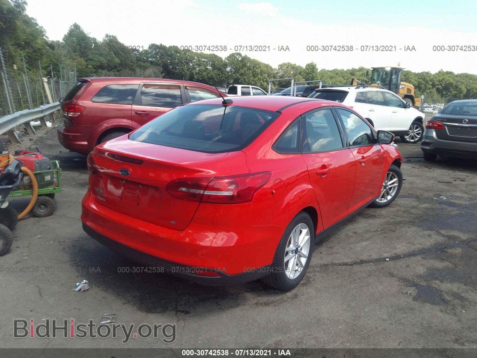 2015 FORD FOCUS - VIN: 1FADP3F28FL295630 - Photo 4