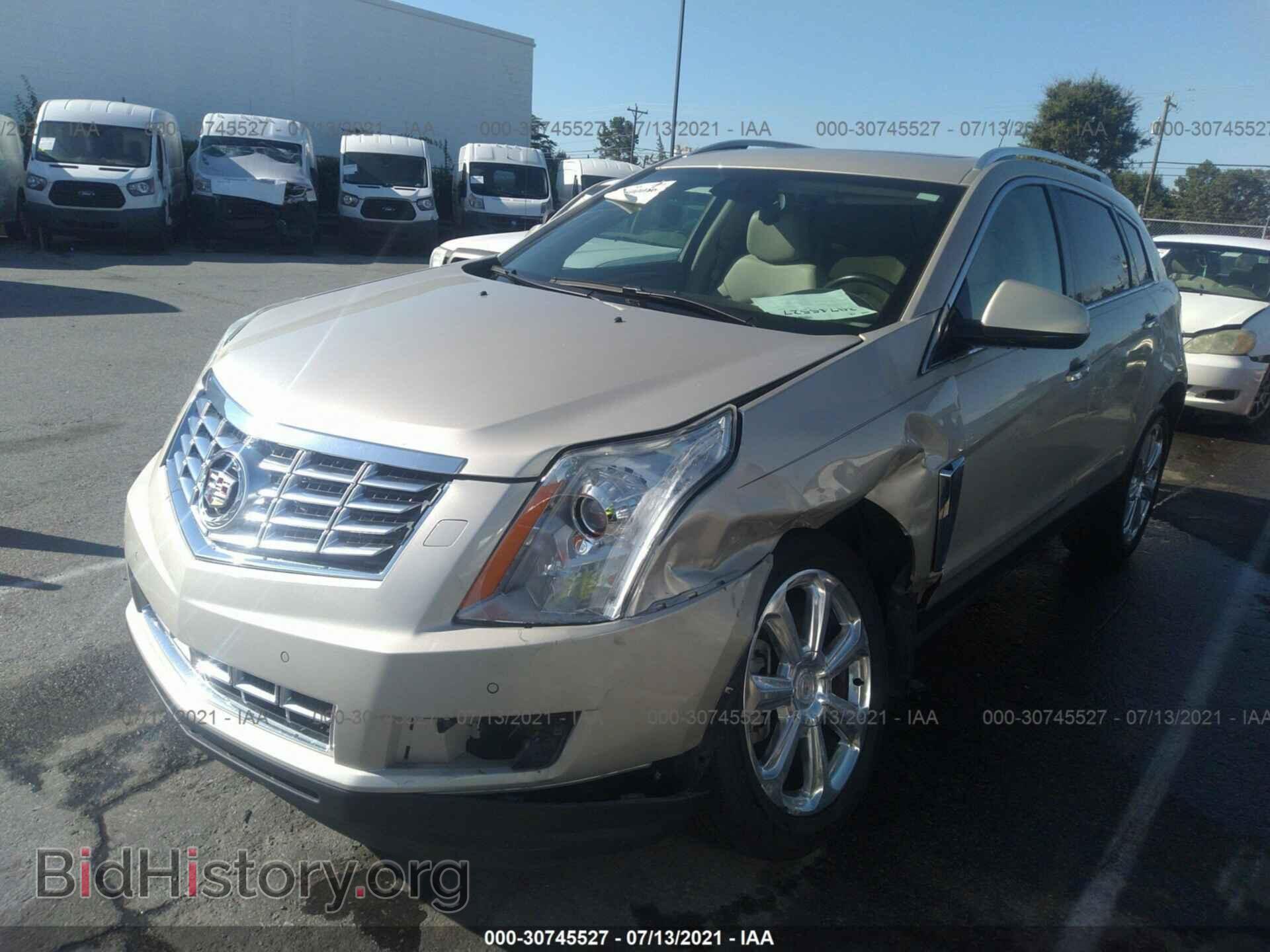 2014 CADILLAC SRX - VIN: 3GYFNCE34ES546858 - Фото 2
