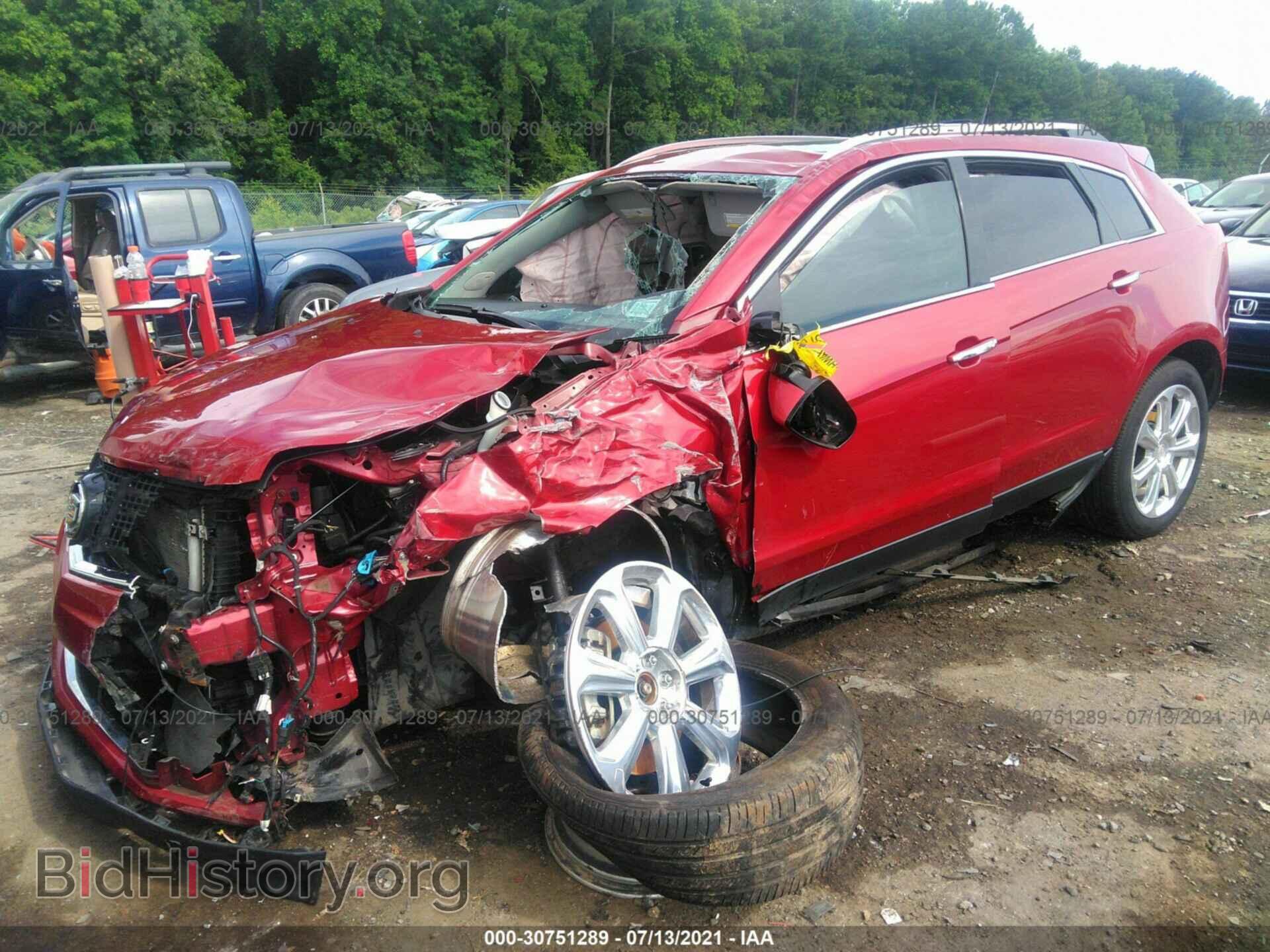 2014 CADILLAC SRX - VIN: 3GYFNDE31ES551134 - Фото 2