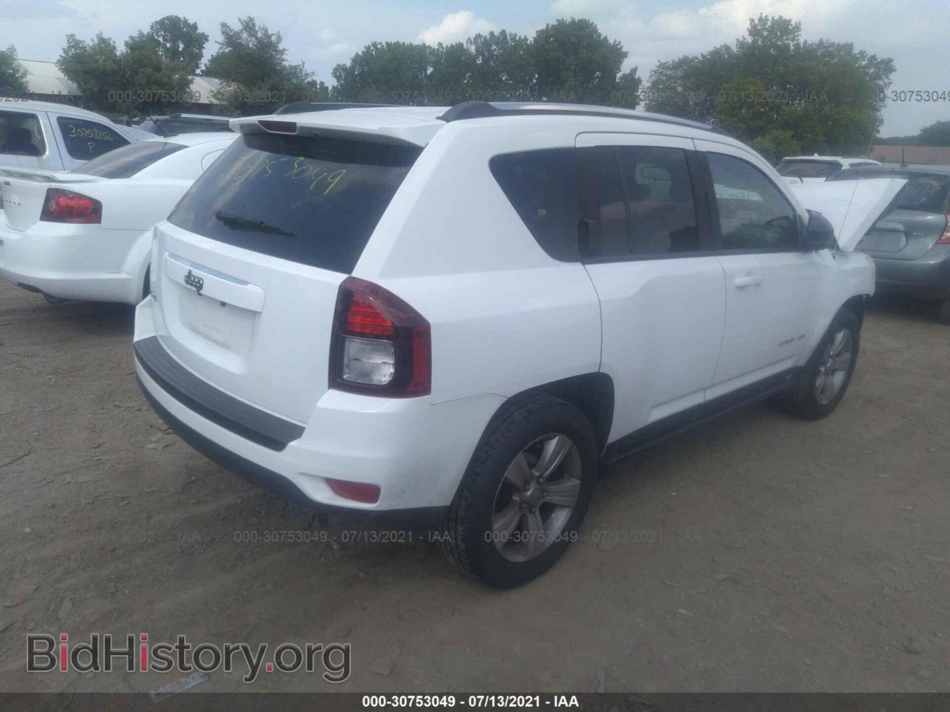 2014 JEEP COMPASS - VIN: 1C4NJDBB7ED777557 - Photo 4
