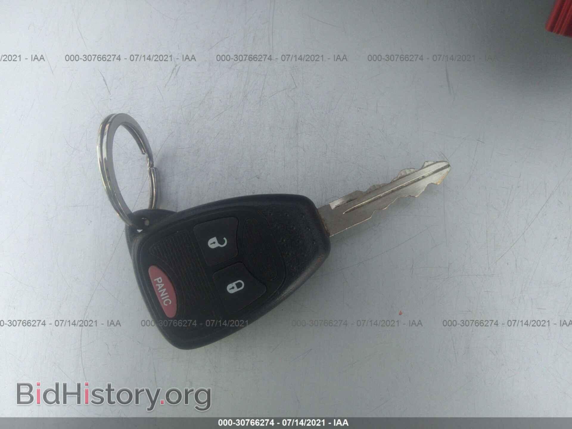 2012 JEEP COMPASS - VIN: 1C4NJCBA2CD565700 - Photo 11