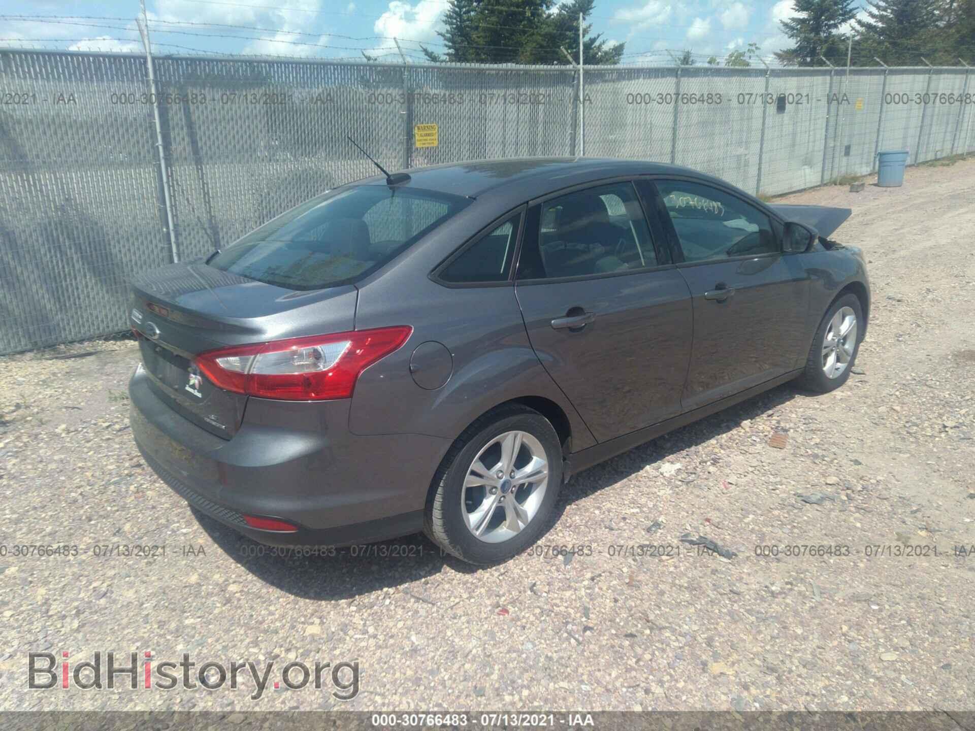 2013 FORD FOCUS - VIN: 1FADP3F29DL200859 - Photo 4
