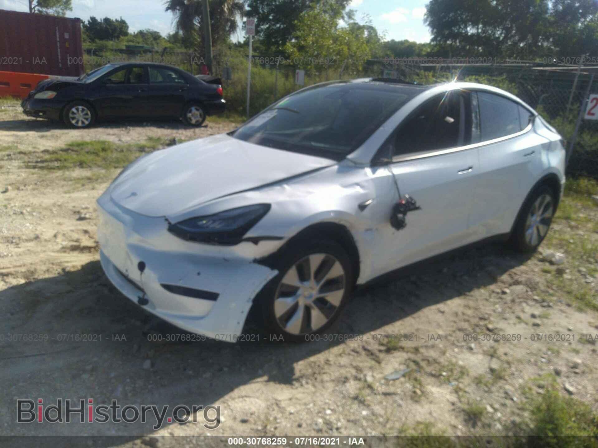 2021 TESLA MODEL Y - VIN: 5YJYGDEE1MF099784 - Фото 2