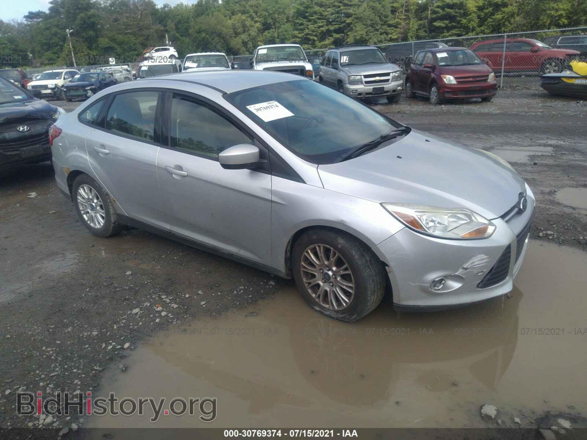 Фотография 1FAHP3F28CL123465 - FORD FOCUS 2012