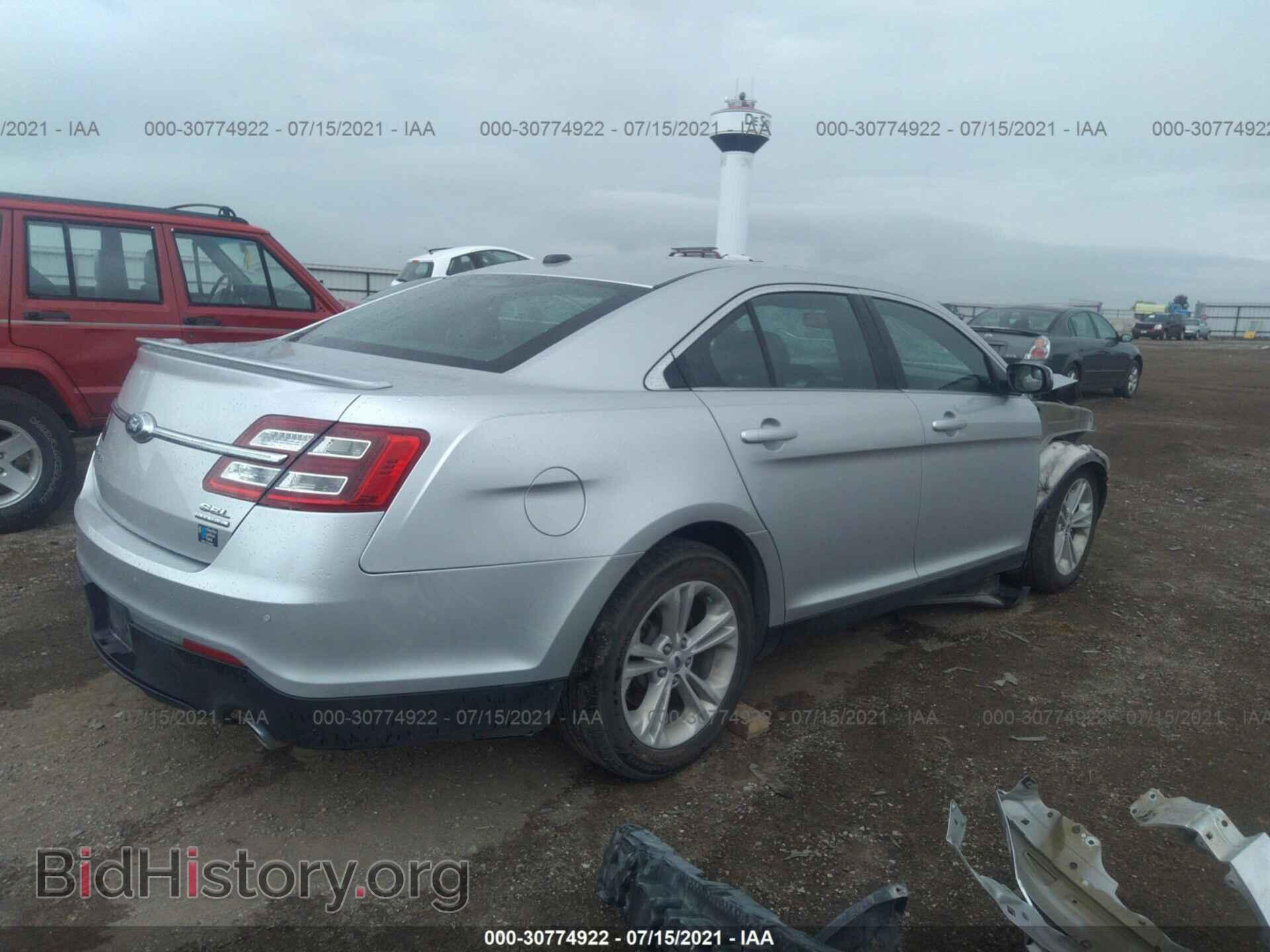 2014 FORD TAURUS - VIN: 1FAHP2E87EG140902 - Фото 4