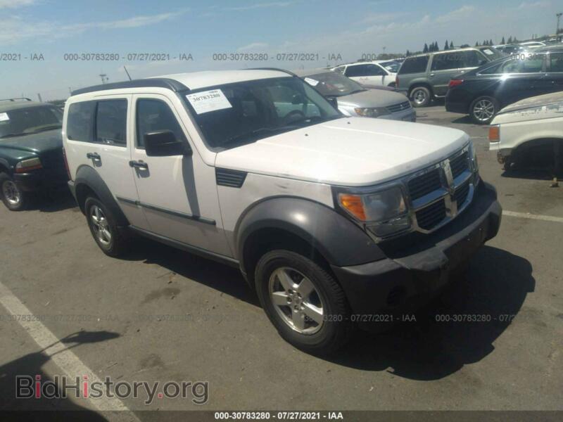 2007 Dodge NITRO SXT (VIN 1D8GU28K17W728357) — photo 1 of 11, IAAI, damage: stripped