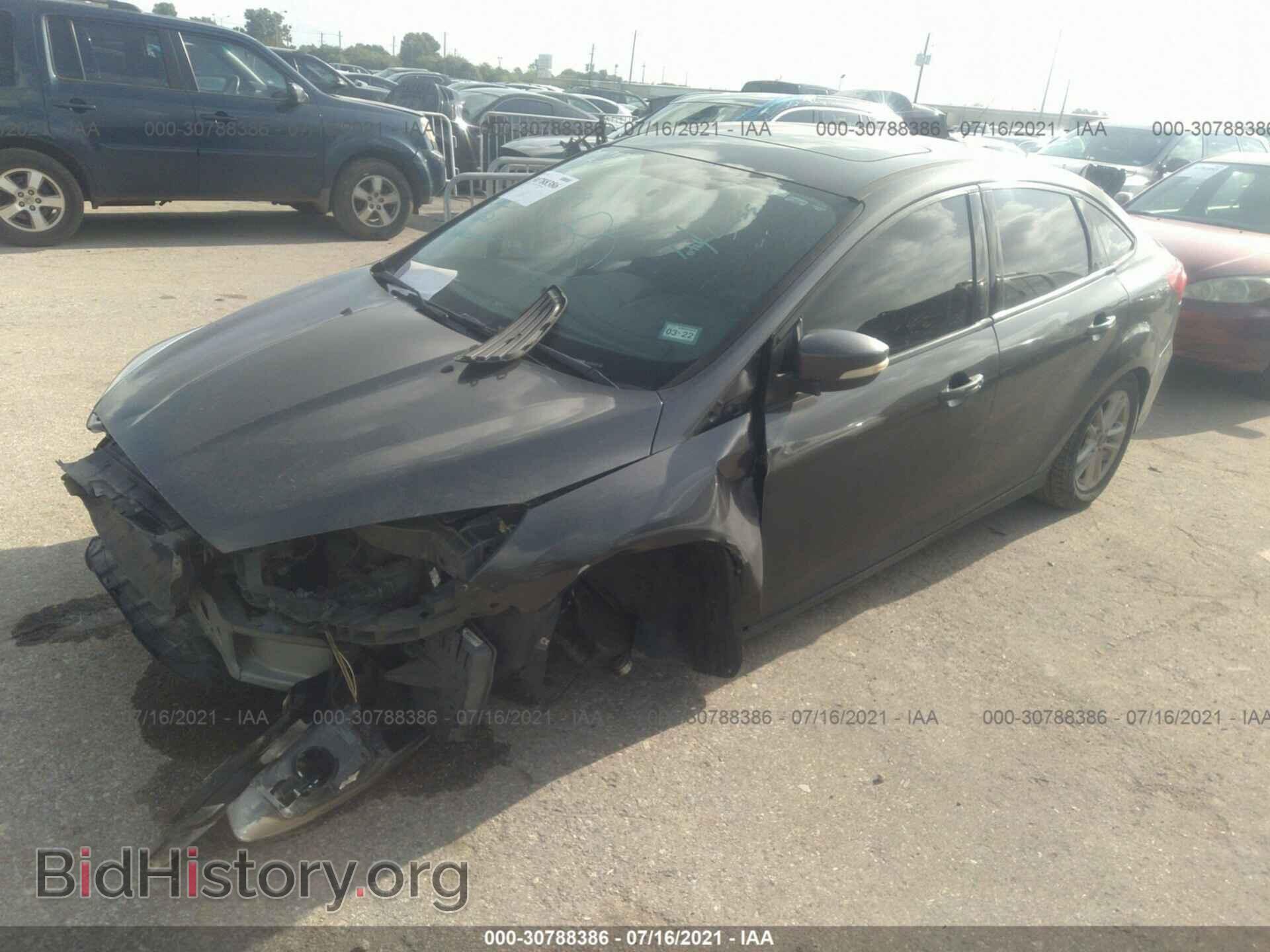 2016 FORD FOCUS - VIN: 1FADP3F24GL259273 - Фото 2