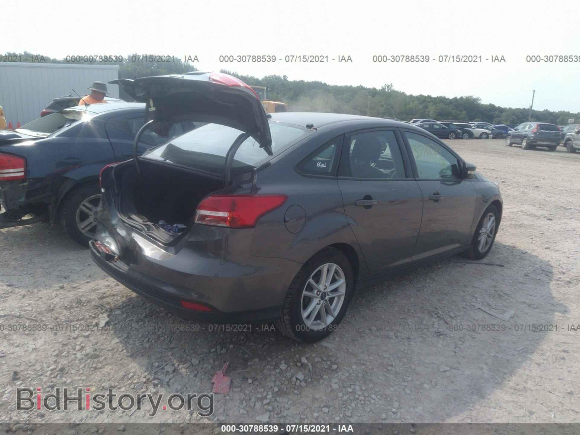 2016 FORD FOCUS - VIN: 1FADP3F24GL390624 - Photo 4