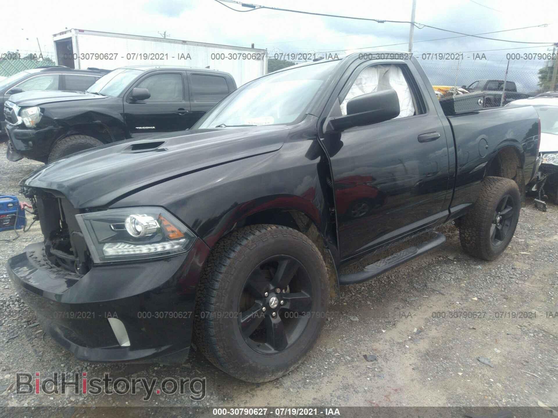 2014 RAM 1500 - VIN: 3C6JR7AT4EG122091 - Фото 2