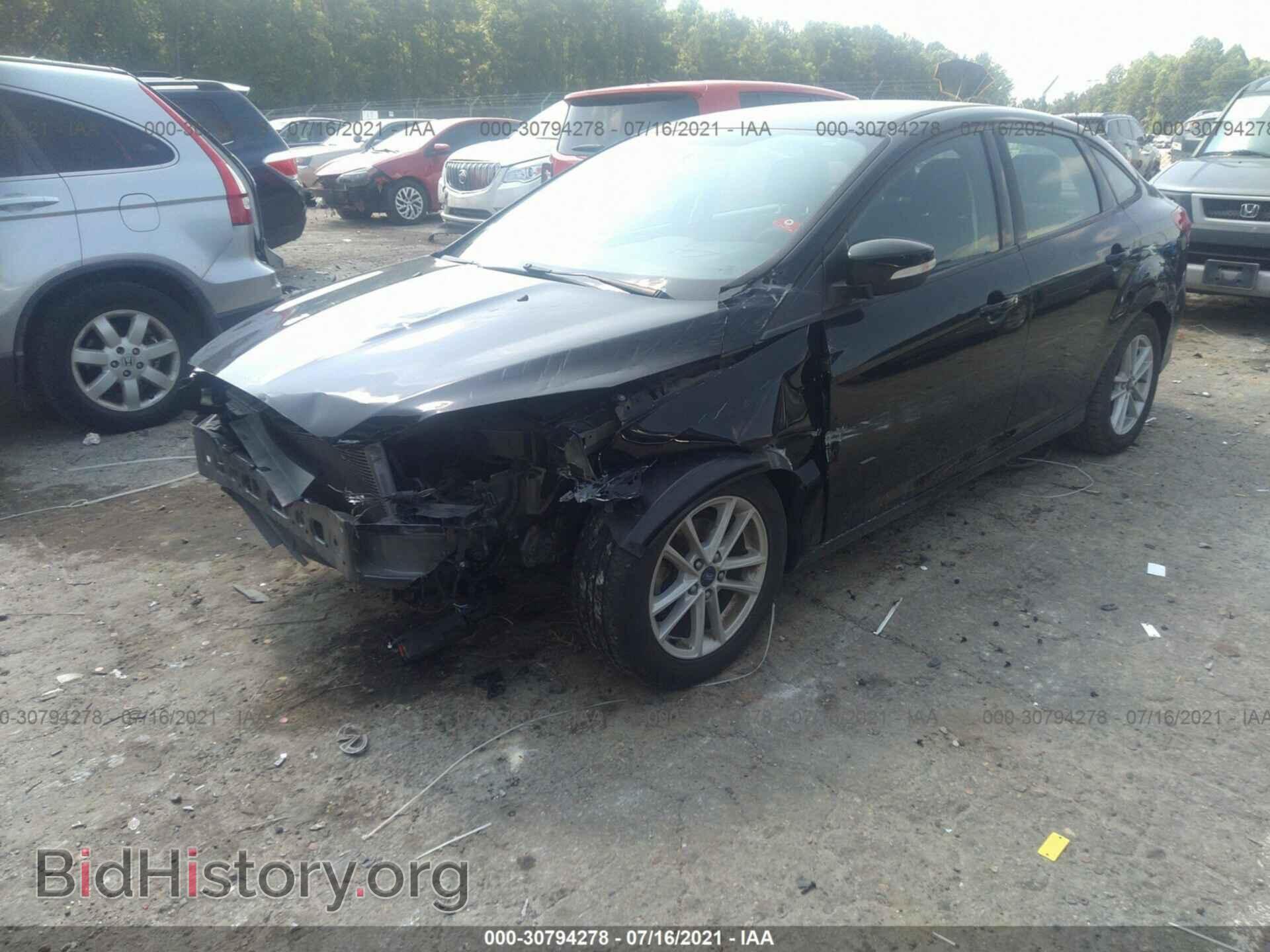 2017 FORD FOCUS - VIN: 1FADP3F24HL297846 - Photo 2