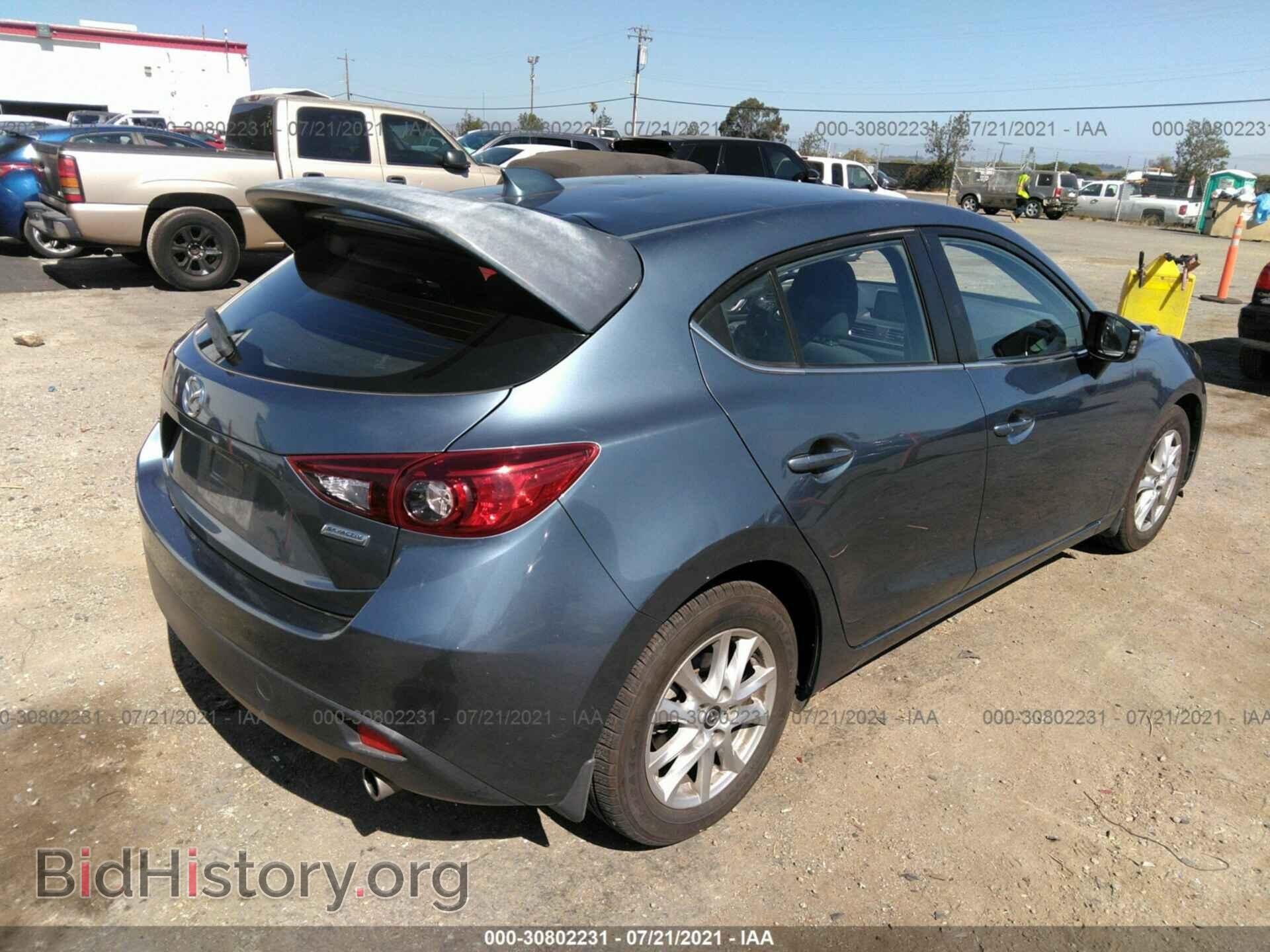2014 MAZDA MAZDA3 - VIN: JM1BM1L77E1204128 - Фото 4