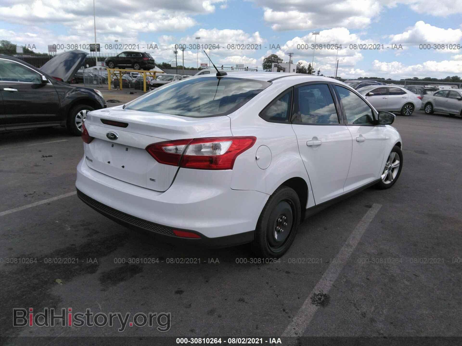 2014 FORD FOCUS - VIN: 1FADP3F21EL215437 - Photo 4