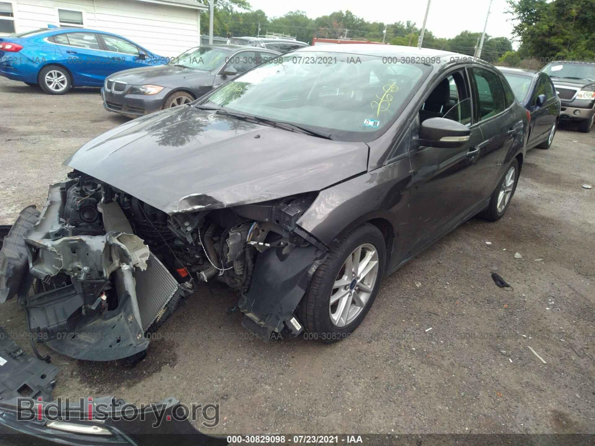 2016 FORD FOCUS - VIN: 1FADP3F21GL266519 - Фото 2