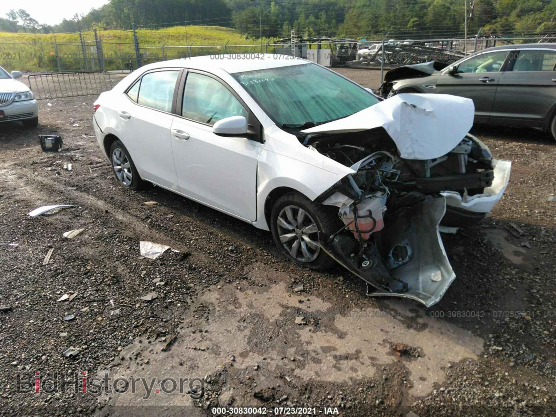 Фотография 2T1BURHEXEC016902 - TOYOTA COROLLA 2014