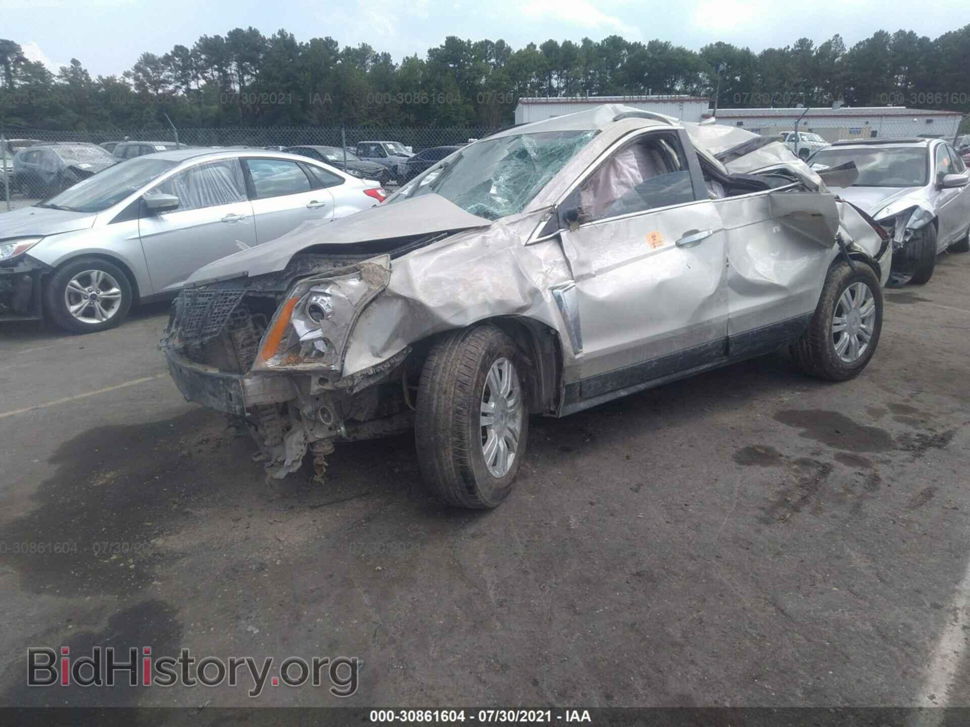 2014 CADILLAC SRX - VIN: 3GYFNAE32ES586733 - Фото 2
