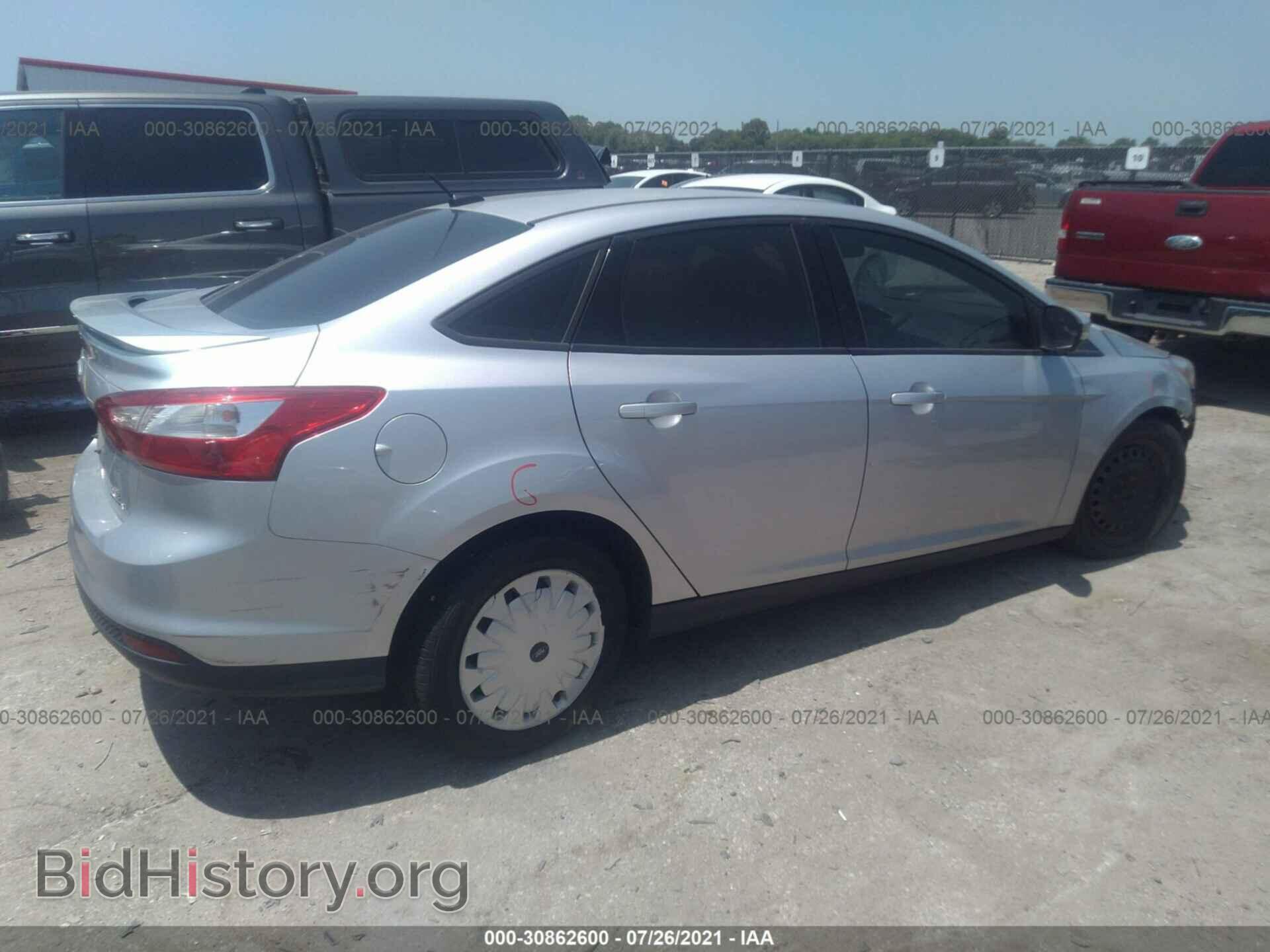 2014 FORD FOCUS - VIN: 1FADP3F21EL393624 - Photo 4