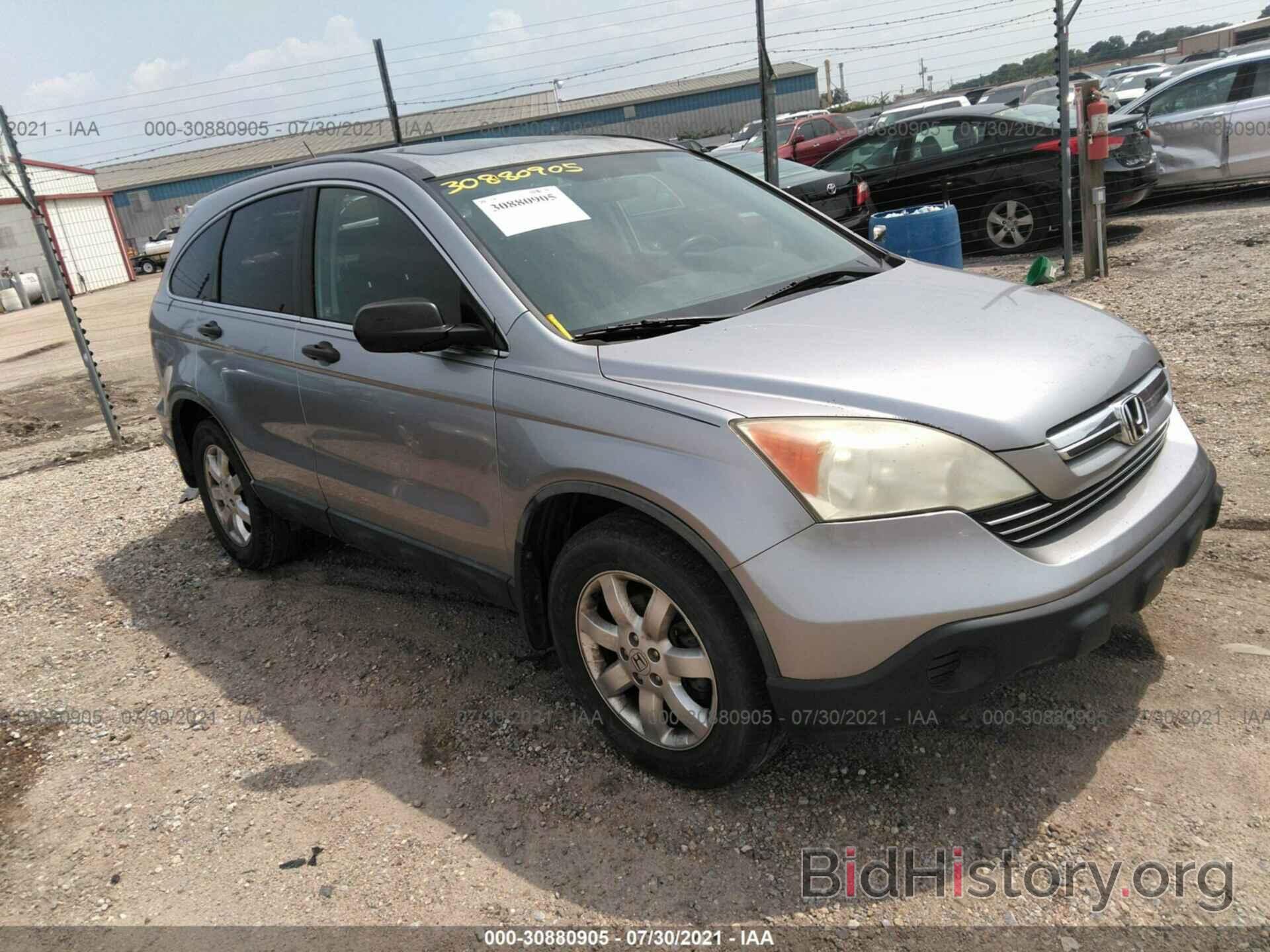 Photo JHLRE38517C067504 - HONDA CR-V 2007