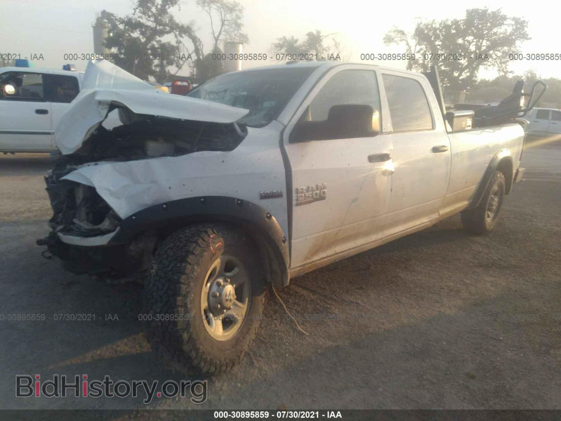 2013 RAM 2500 - VIN: 3C6TR4HT8DG560172 - Фото 2