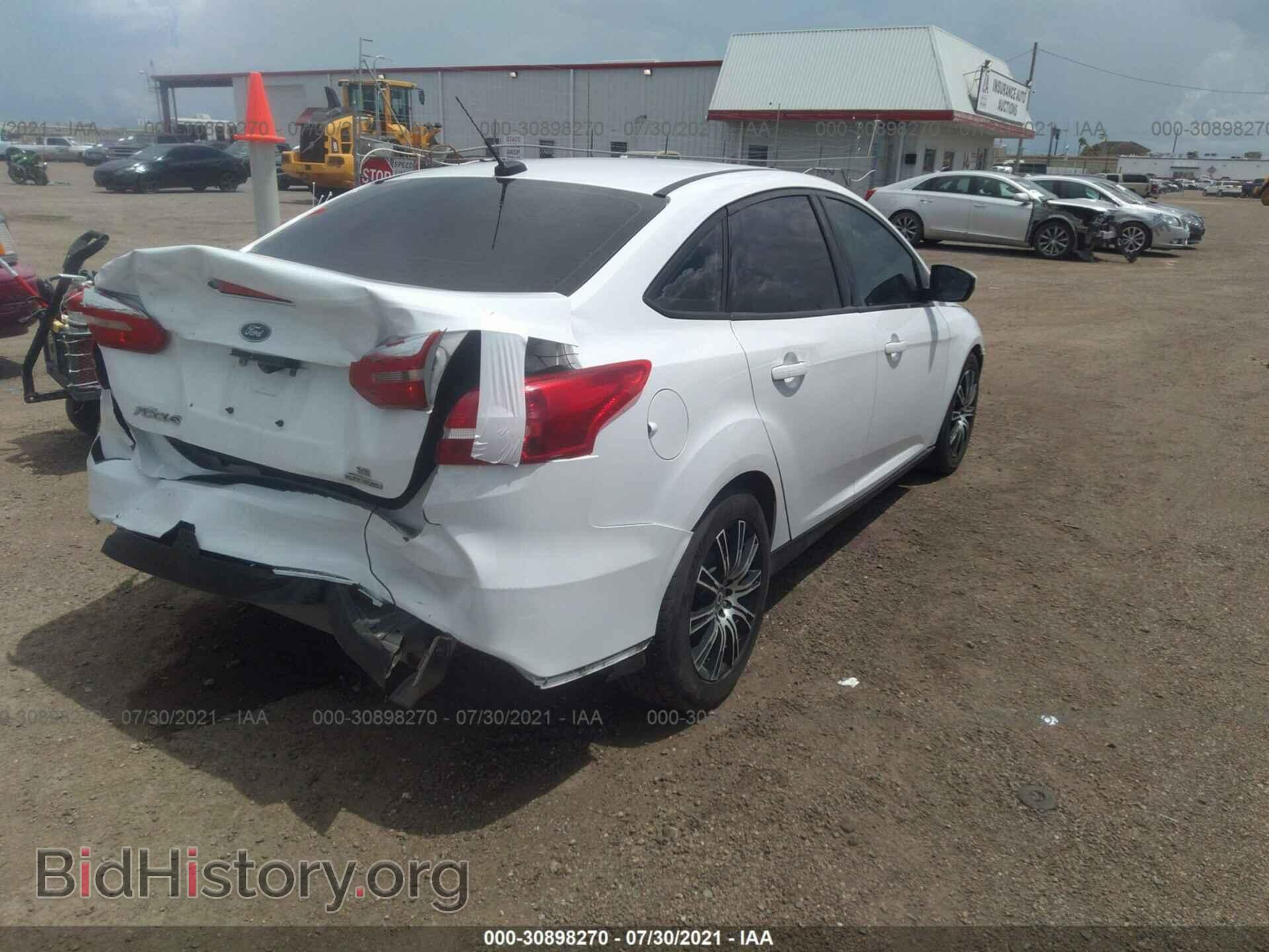 2016 FORD FOCUS - VIN: 1FADP3F26GL291531 - Фото 4