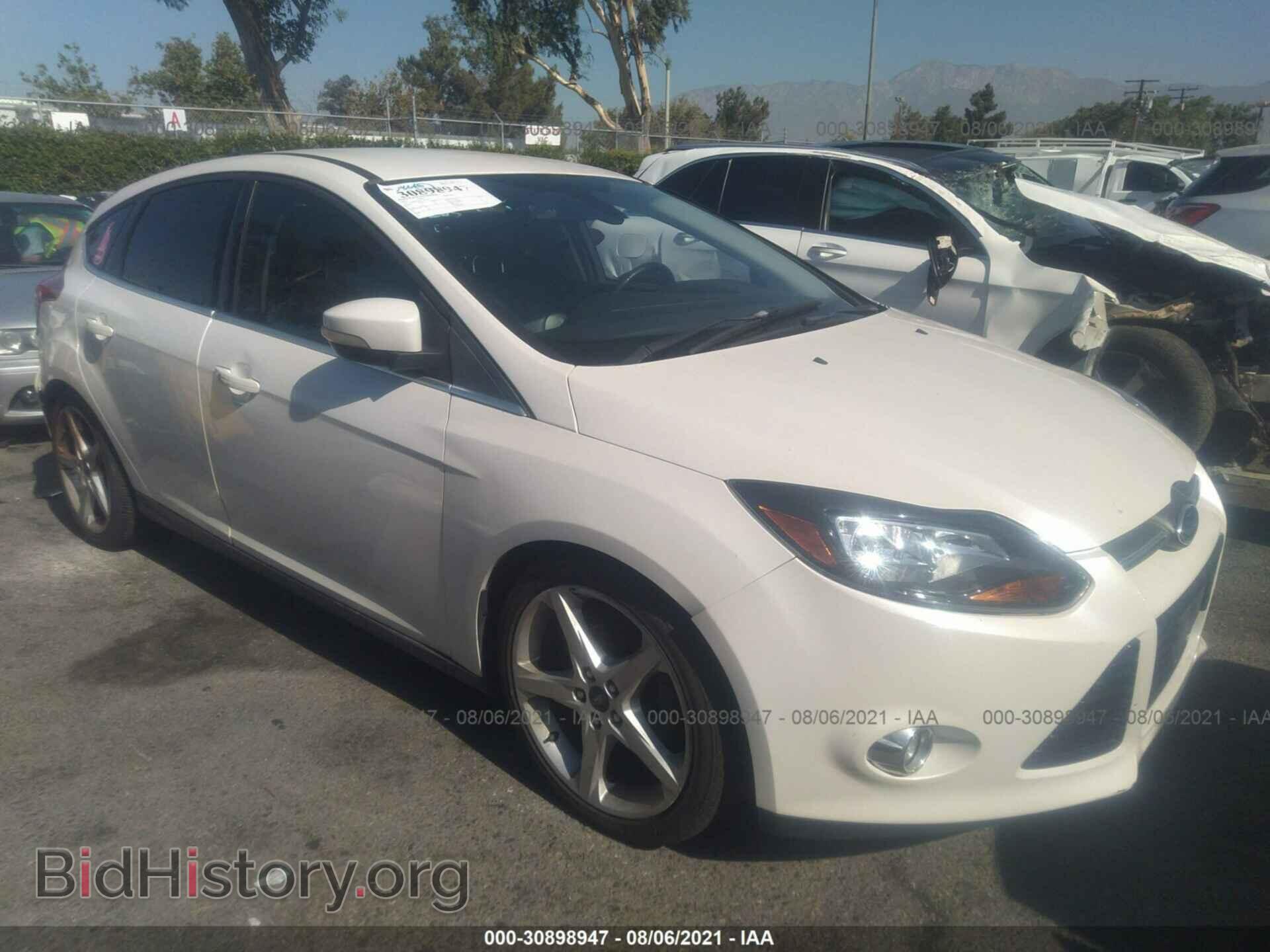 Фотография 1FAHP3N29CL382242 - FORD FOCUS 2012