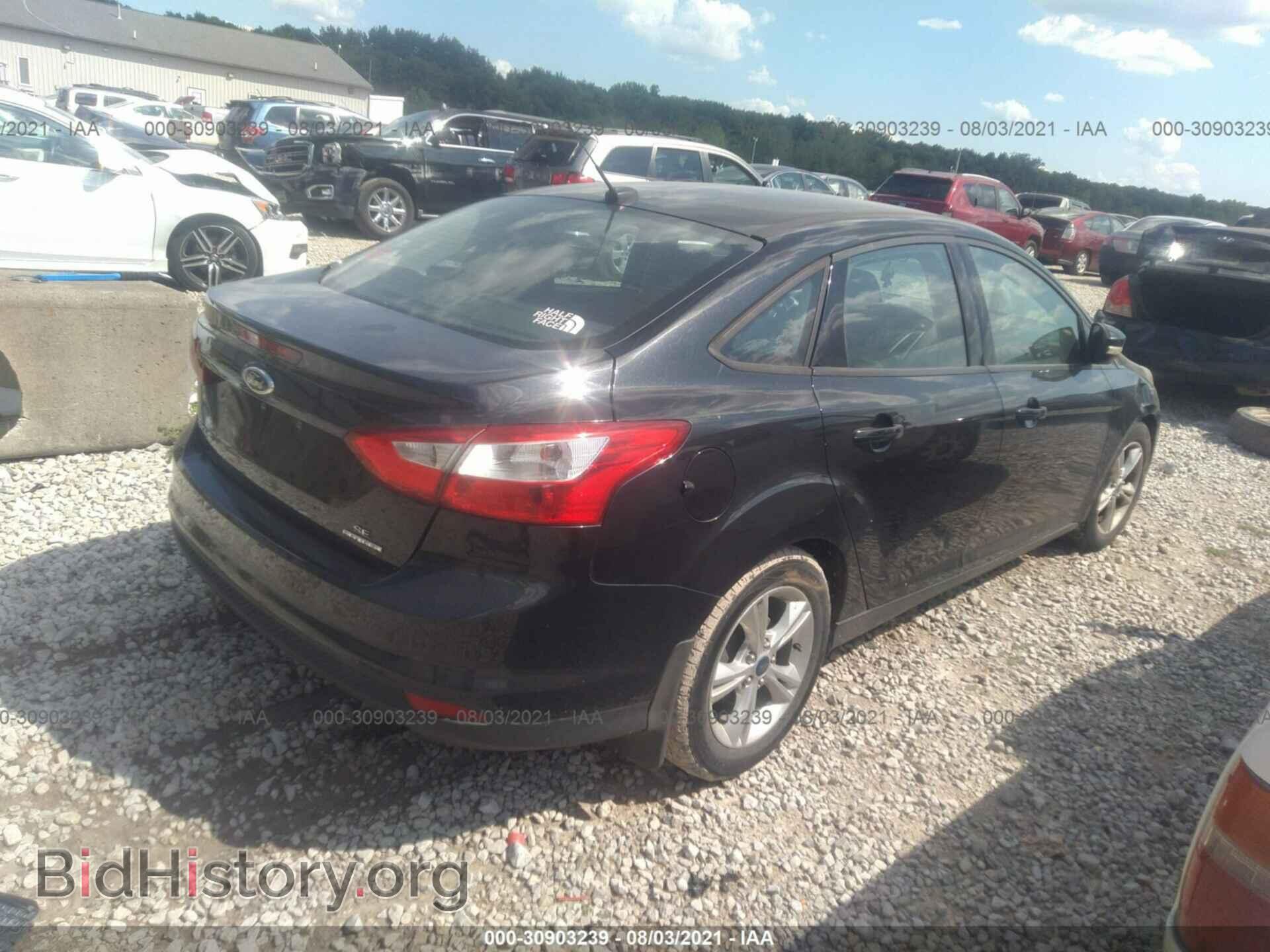 2014 FORD FOCUS - VIN: 1FADP3F24EL195085 - Photo 4
