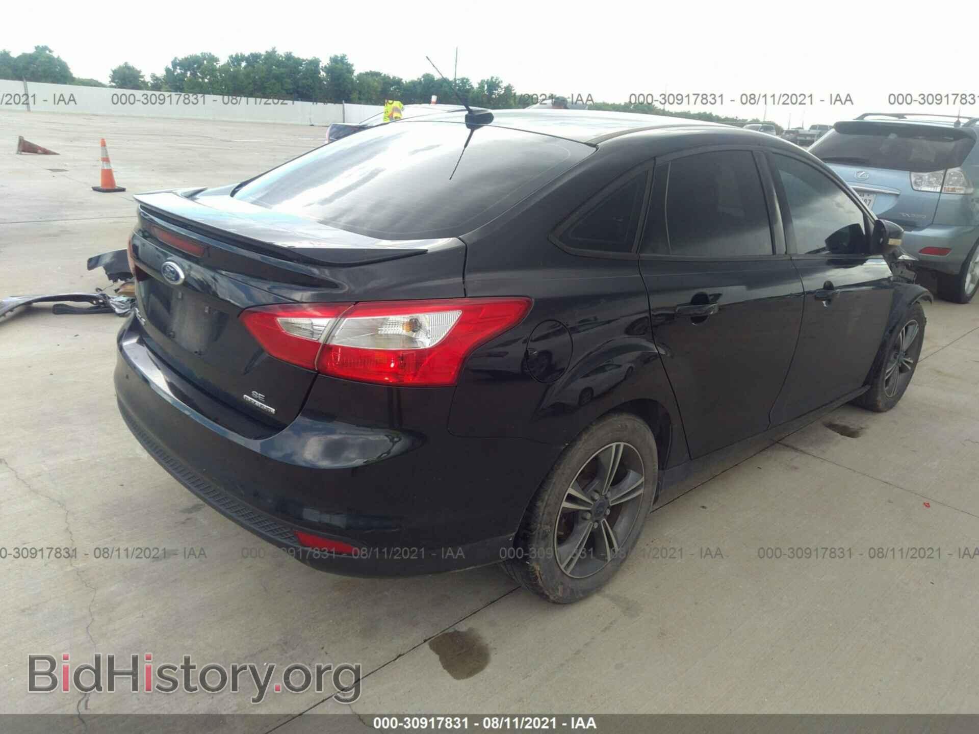 2014 FORD FOCUS - VIN: 1FADP3F22EL342293 - Photo 4