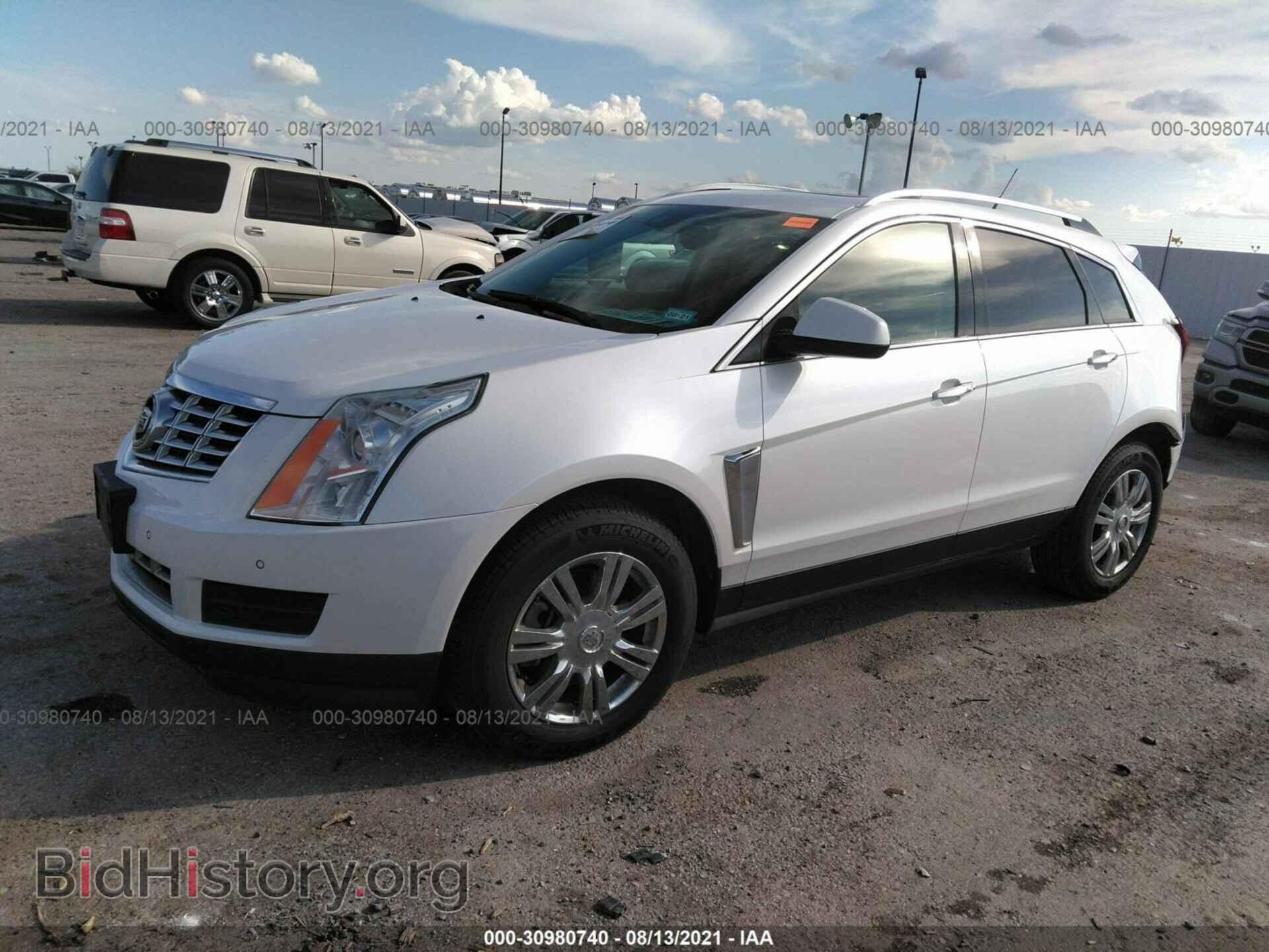 2013 CADILLAC SRX - VIN: 3GYFNCE30DS622817 - Фото 2