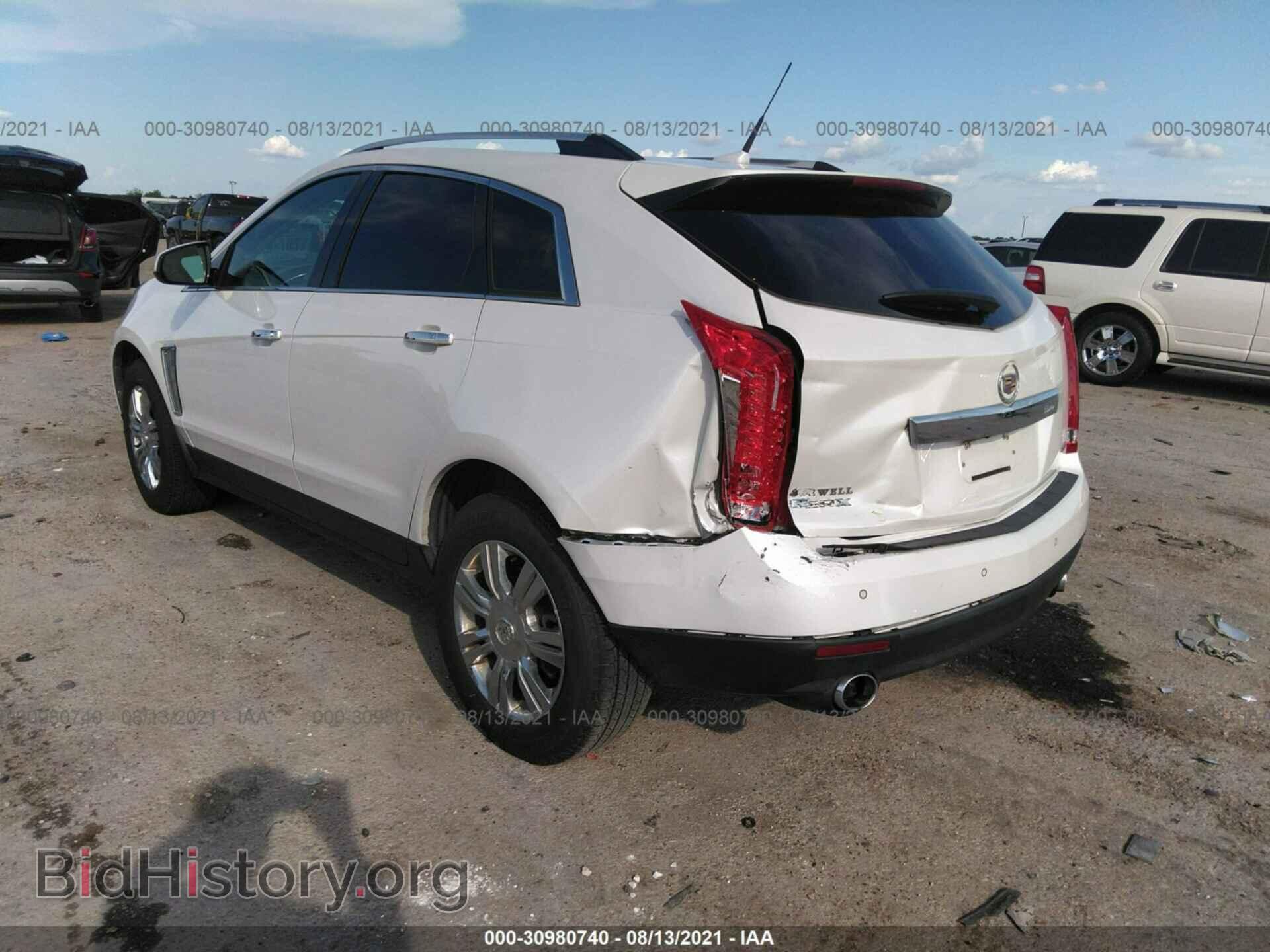 2013 CADILLAC SRX - VIN: 3GYFNCE30DS622817 - Фото 3