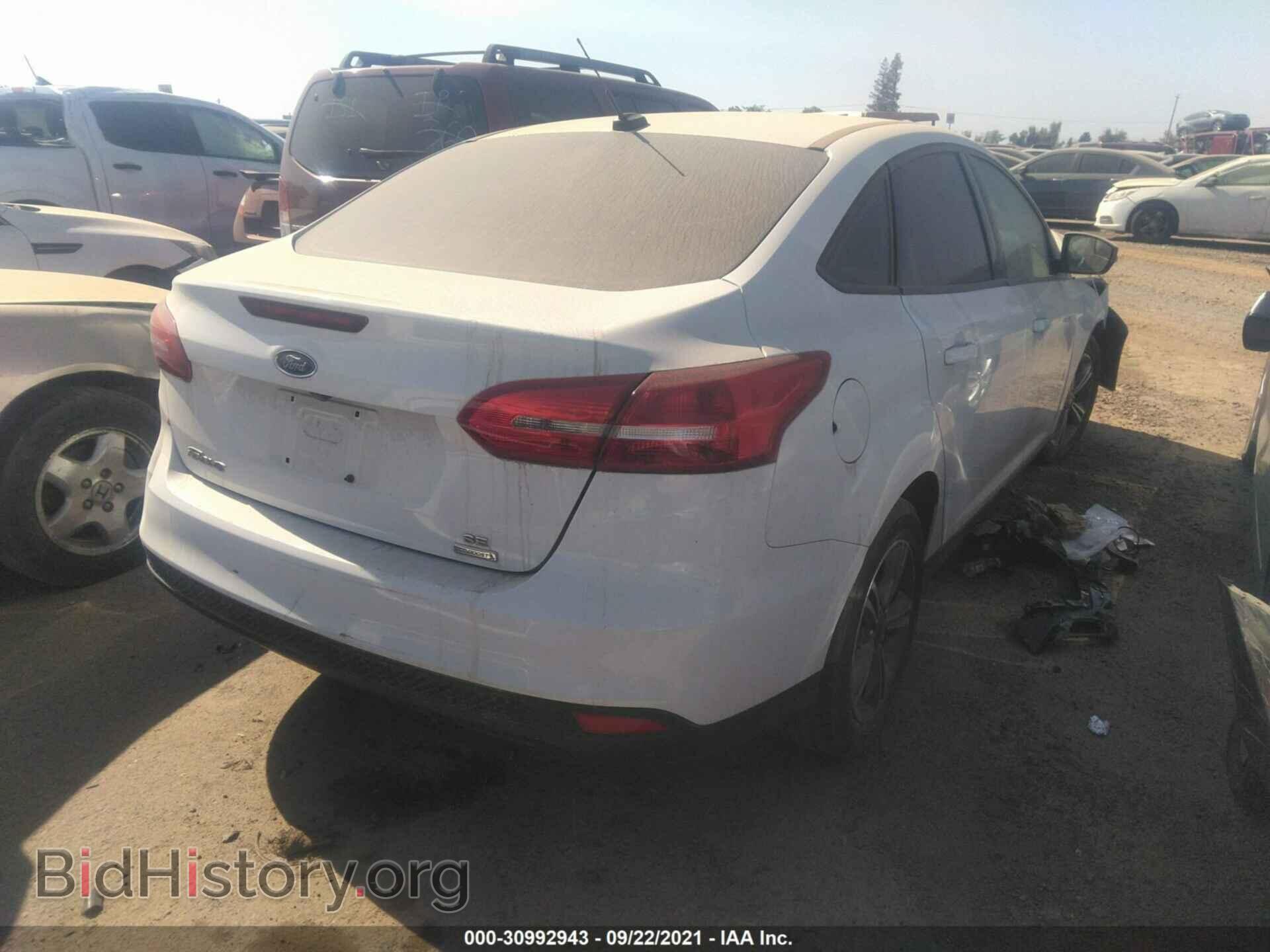 2017 FORD FOCUS - VIN: 1FADP3FE0HL308674 - Фото 4