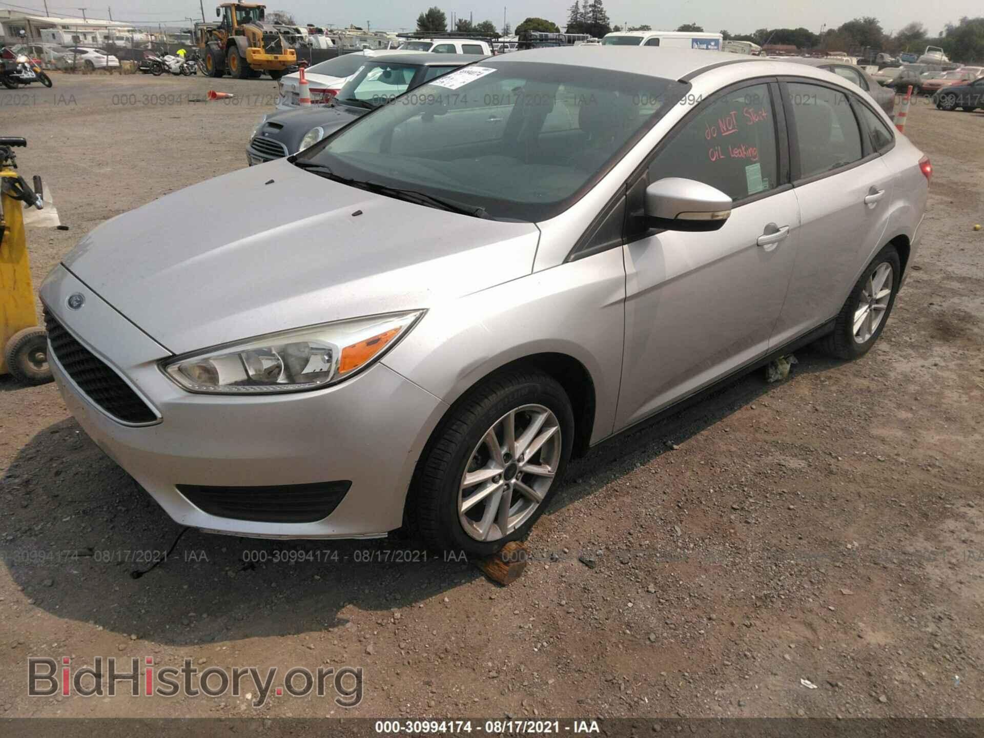2016 FORD FOCUS - VIN: 1FADP3F21GL337704 - Фото 2