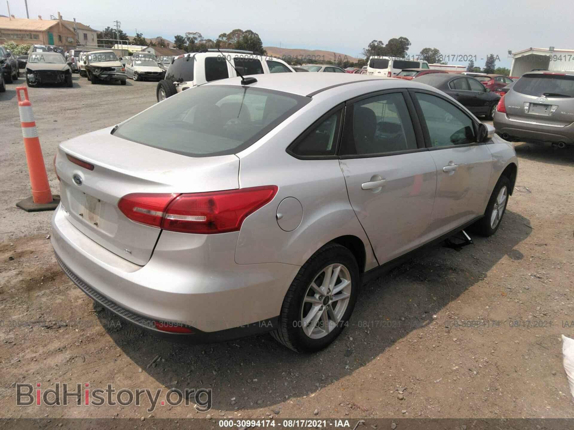 2016 FORD FOCUS - VIN: 1FADP3F21GL337704 - Фото 4