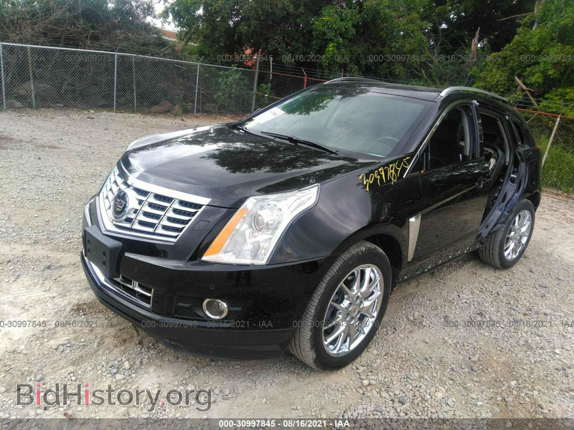 2013 CADILLAC SRX - VIN: 3GYFNEE31DS591993 - Фото 2