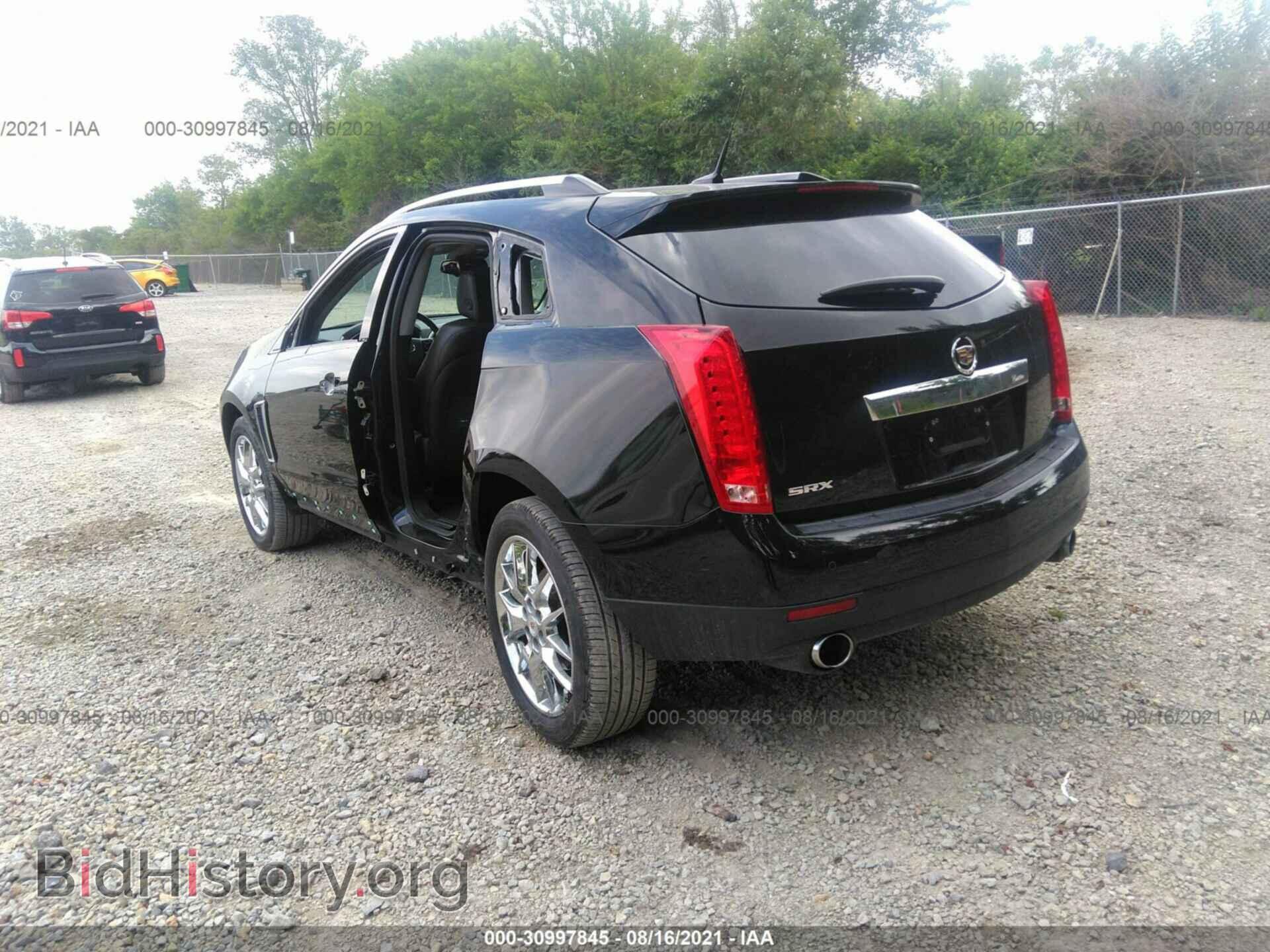 2013 CADILLAC SRX - VIN: 3GYFNEE31DS591993 - Фото 3