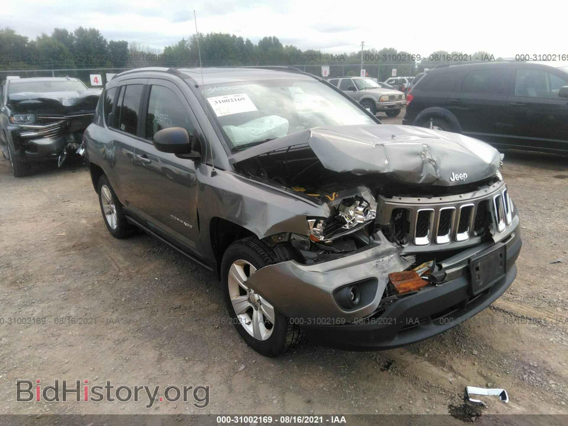 Photo 1J4NF1FB8BD282946 - JEEP COMPASS 2011