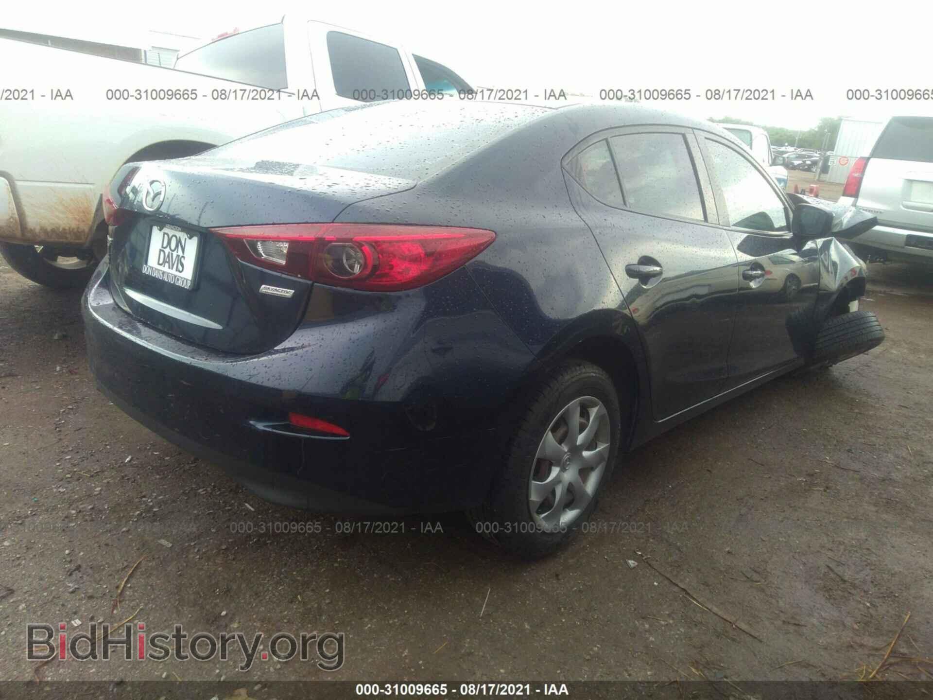 2014 MAZDA MAZDA3 - VIN: JM1BM1U70E1121171 - Фото 4