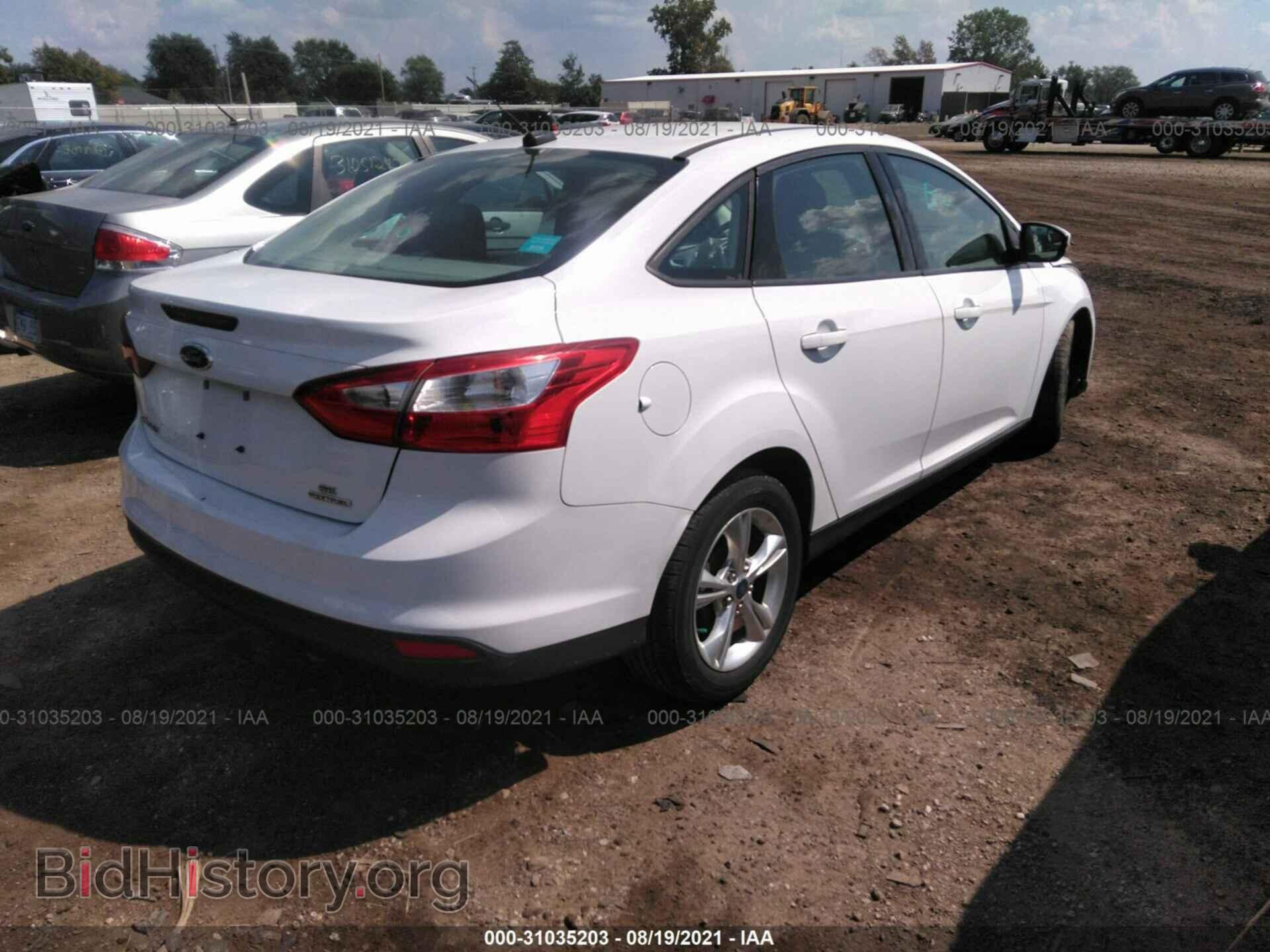 2014 FORD FOCUS - VIN: 1FADP3F21EL371218 - Photo 4