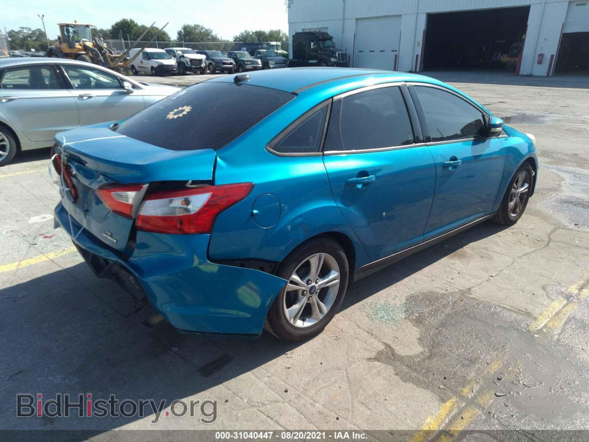 2014 FORD FOCUS - VIN: 1FADP3F24EL150339 - Photo 4